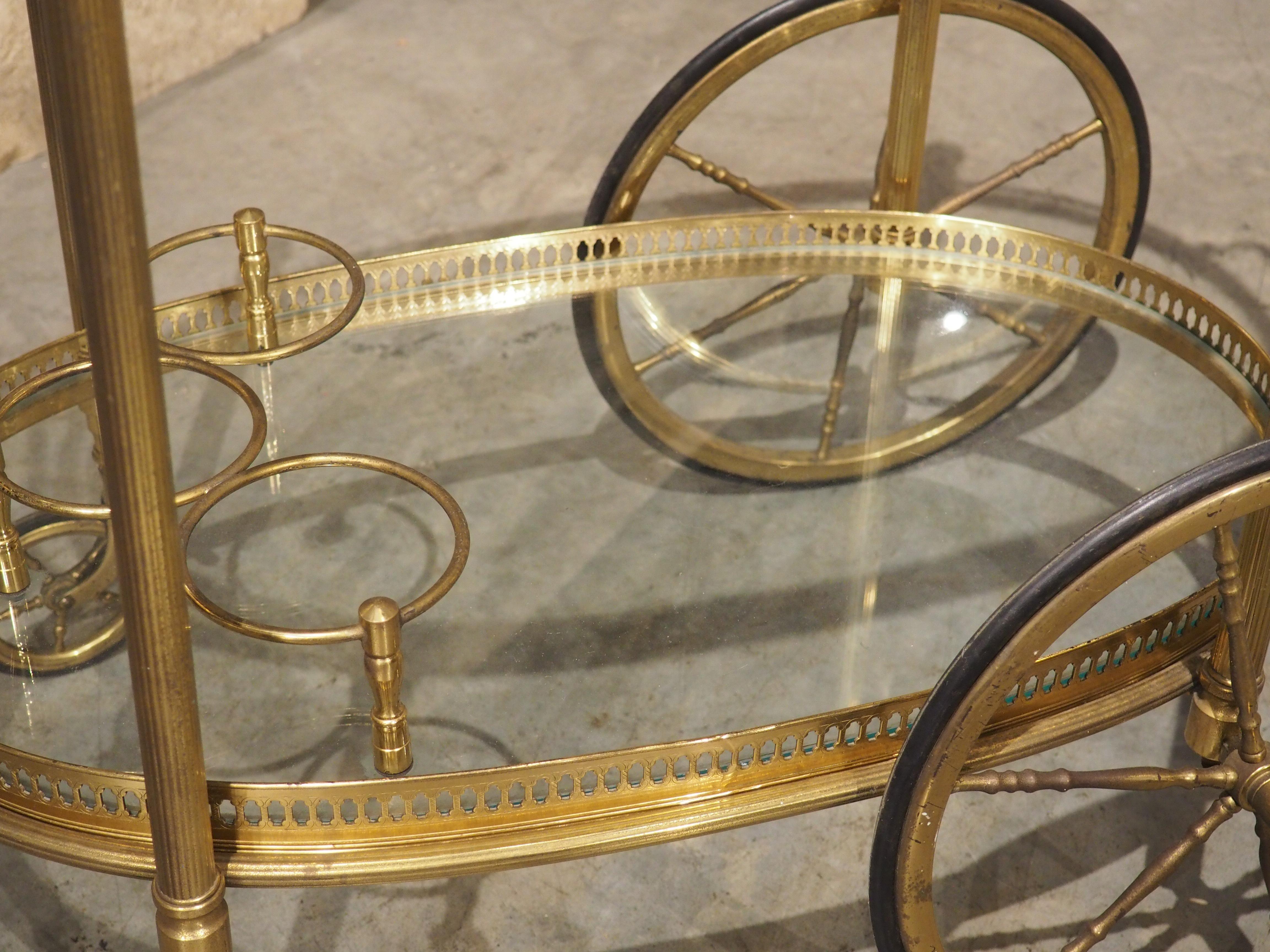 Metal French Mid-Century Gilded Brass and Glass Bar Cart, Attributed to Maison Baguès