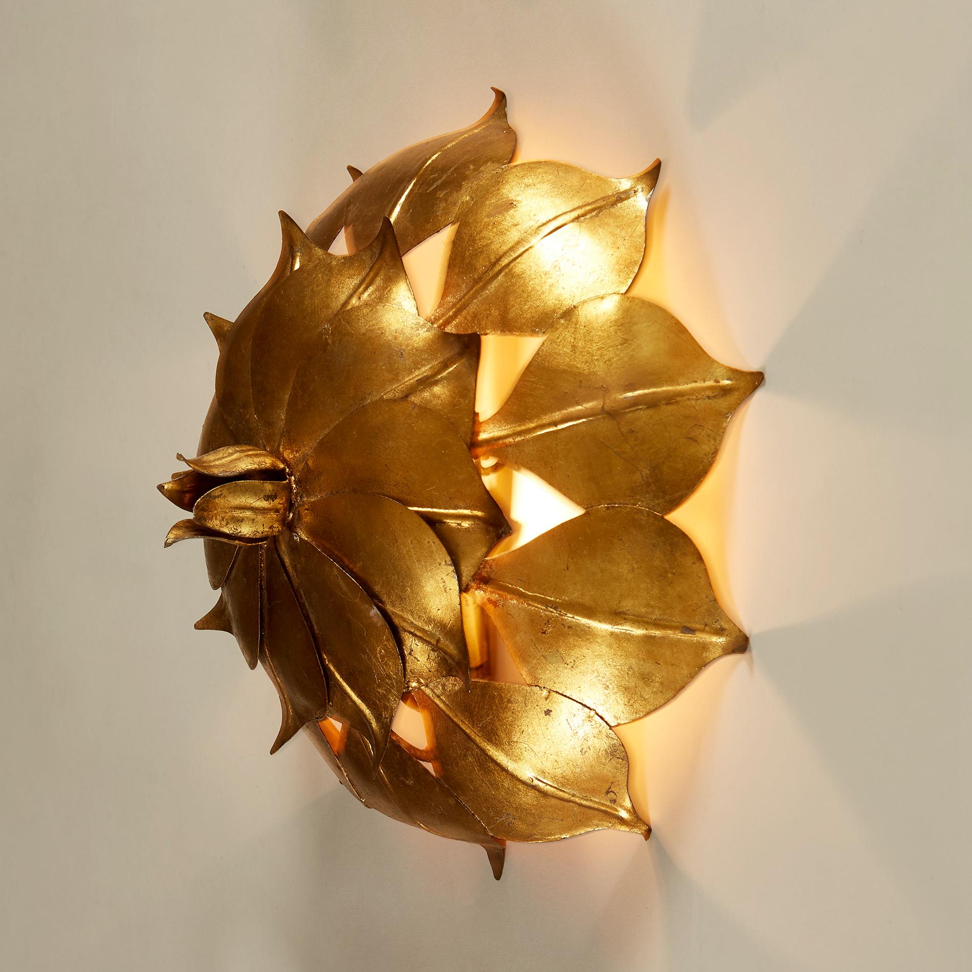 Double petal gold leaf wall light with centre bud.