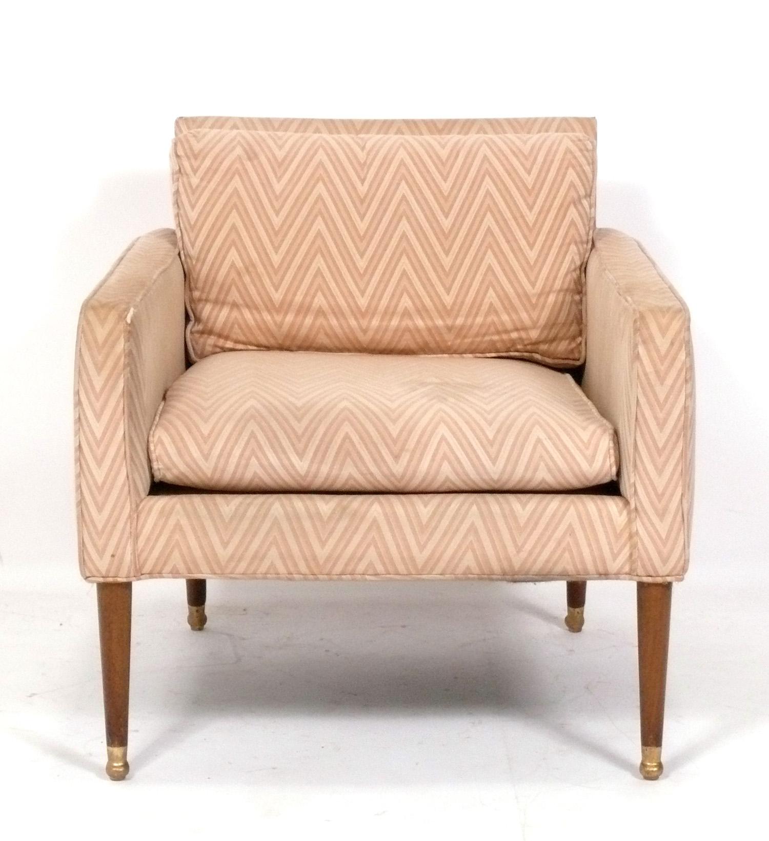 Elegant French lounge chair, France, circa 1940s. This chair is being completely reupholstered, and can be completed in your fabric. Simply send us 6 yards of your fabric after purchase.