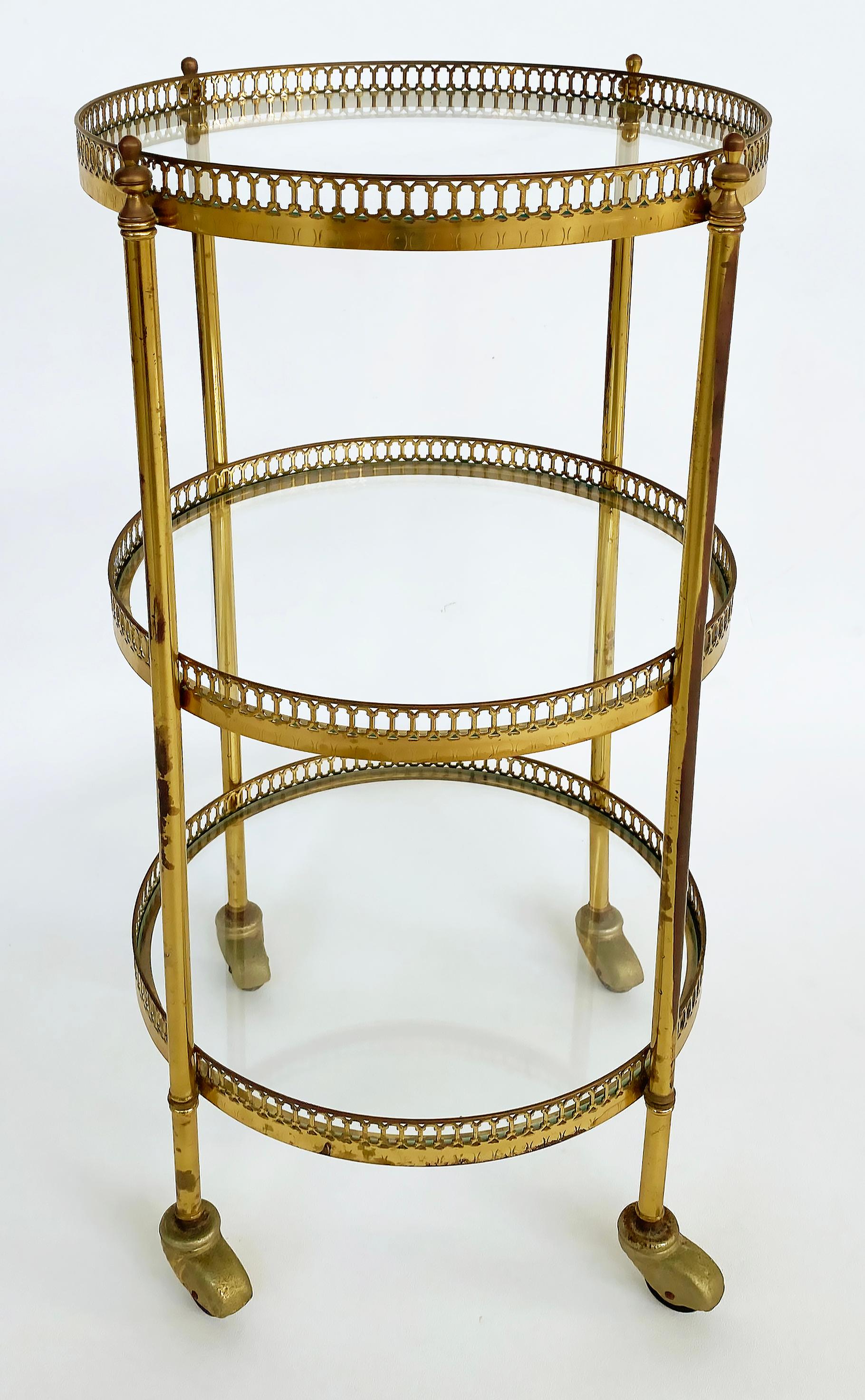 Mid-Century Modern French Mid-century Modern 3-Tiered Brass and Glass Table on Casters For Sale