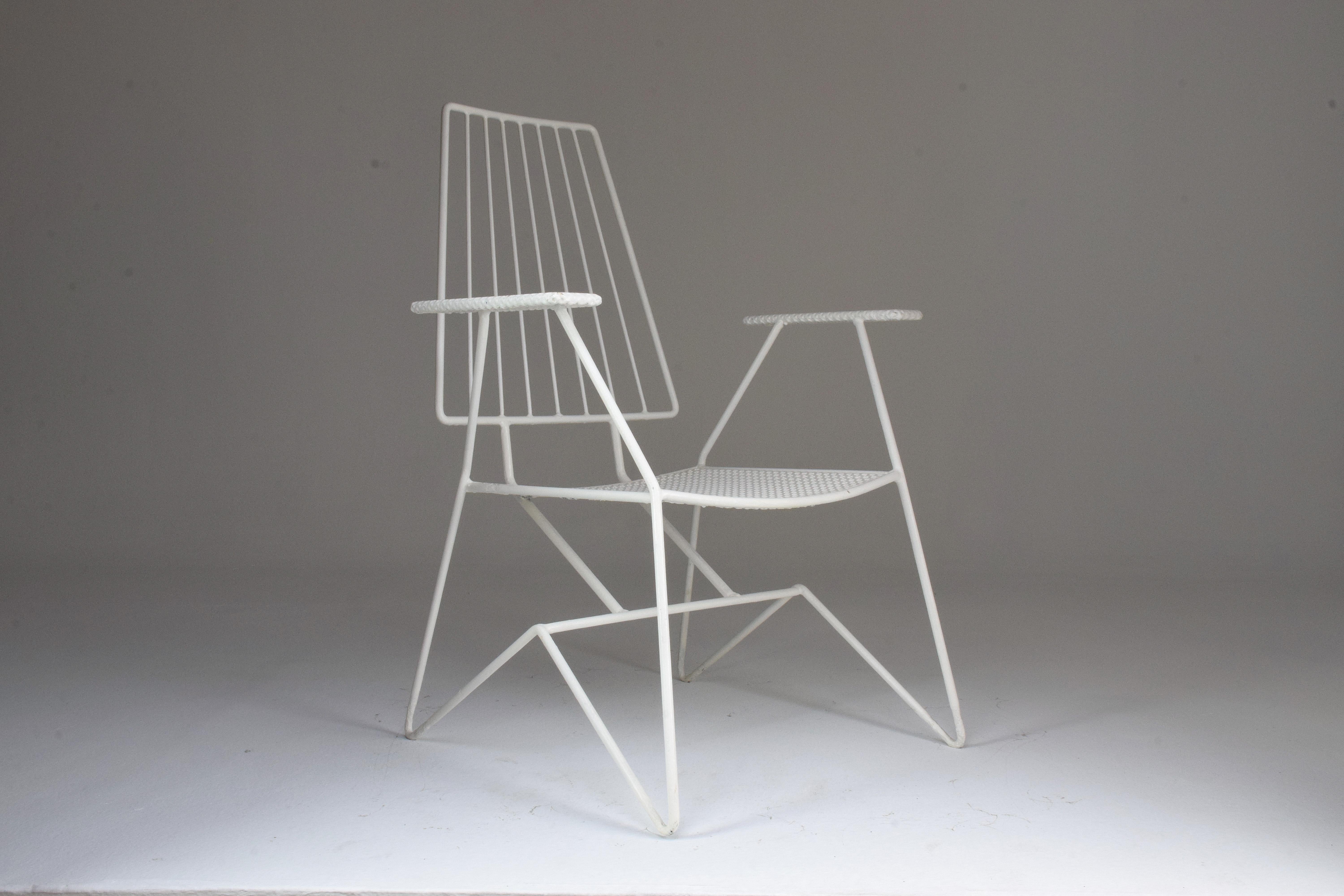 A 20th-century vintage garden armchair by the iconic French designer Mathieu Matégot was designed with his distinct perforated sheet metal and steel tube structure. In white lacquer.
A table in the same style is also available.
France, circa the