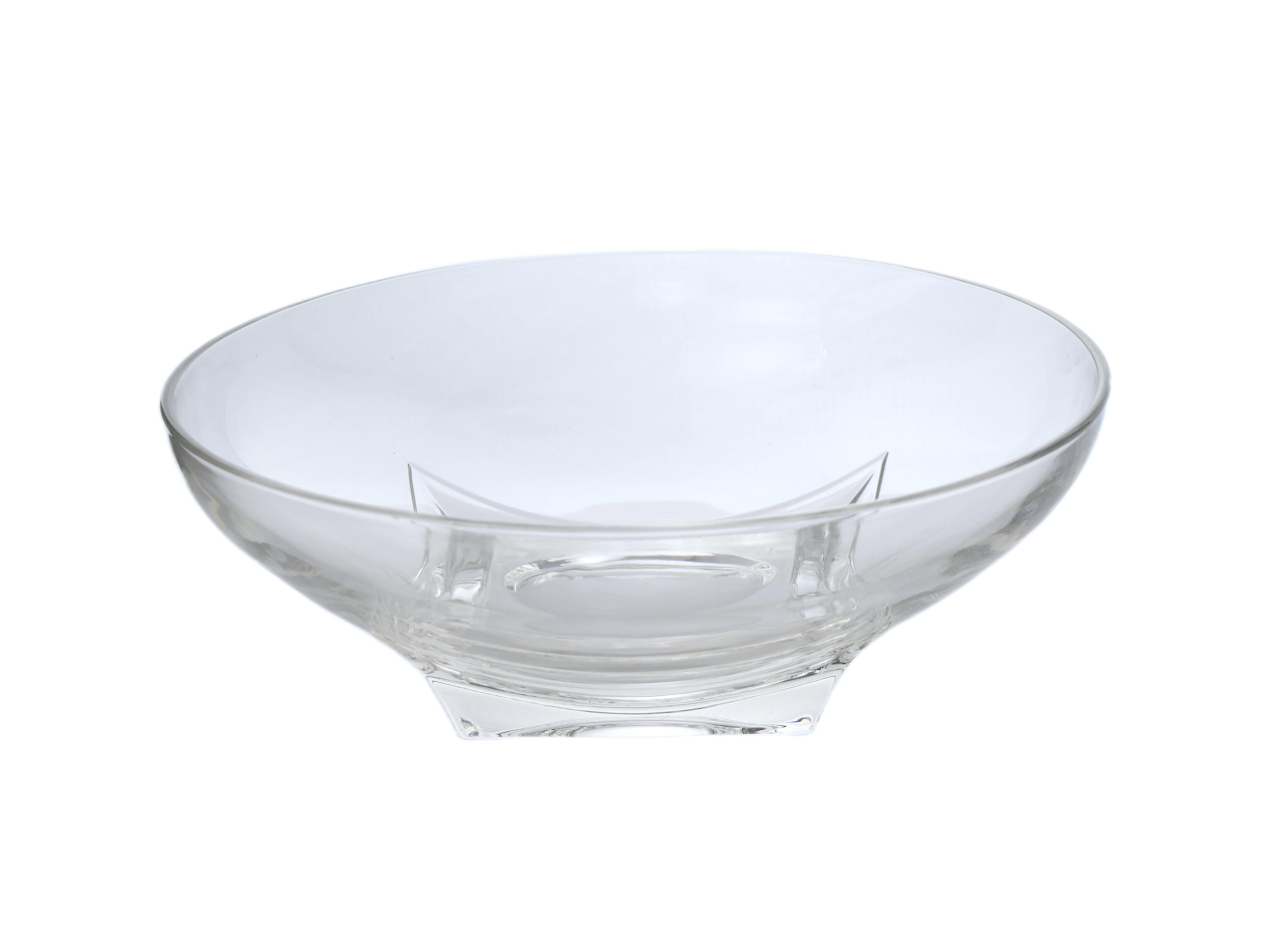 Envelop yourself in the timeless allure of French Mid-Century Modern Art Deco Style with this captivating Glass Centerpiece Bowl. Meticulously designed, this bowl captures the essence of an era known for its blend of elegance and modernity. The