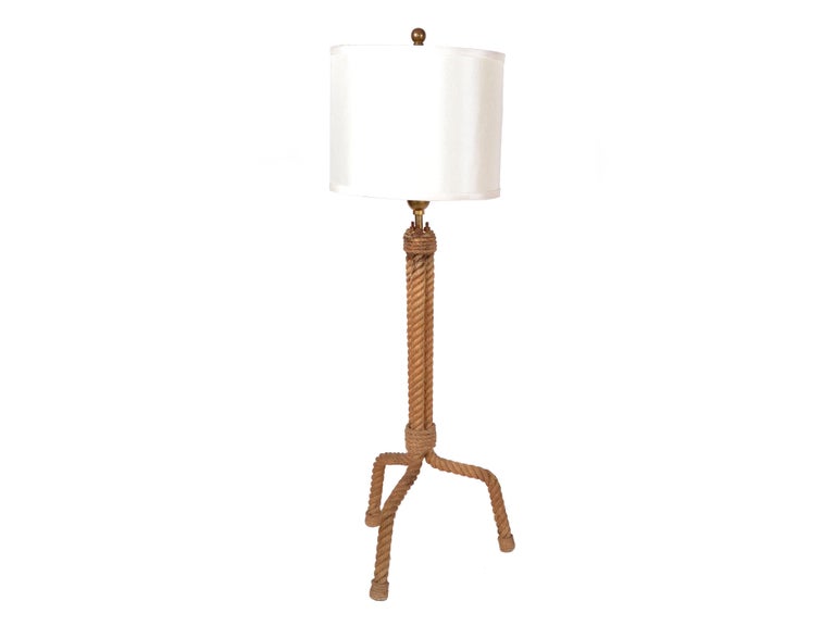 Rope table lamp by Adrien Audoux and Frida Minet, France, circa 1960.
Wired for US and in working condition.
1 bulb 100W.
Sold with shade.
Height to top of socket: 30inches.
Height to top of finial: 37 inches.