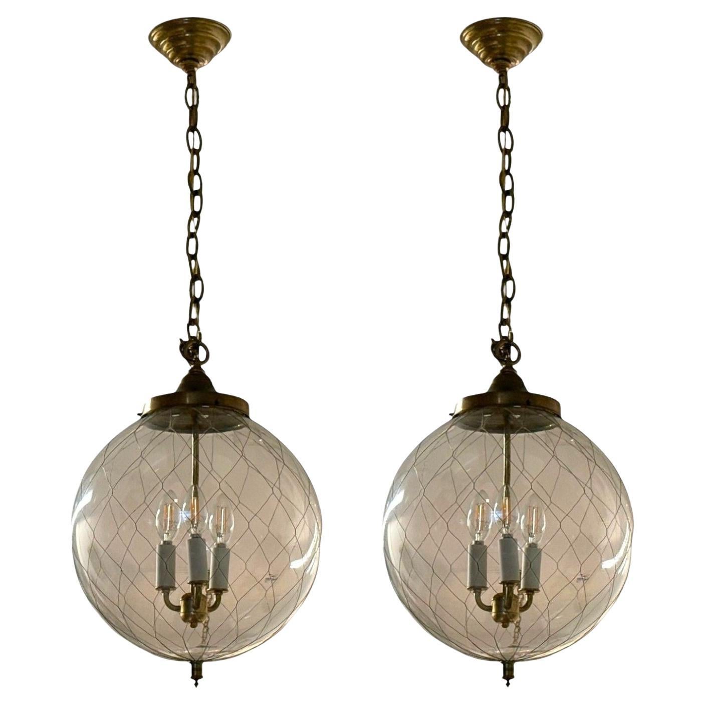 French Mid Century Modern, Brass, Blown Glass, Globe Pendant Lights, 1950s en venta