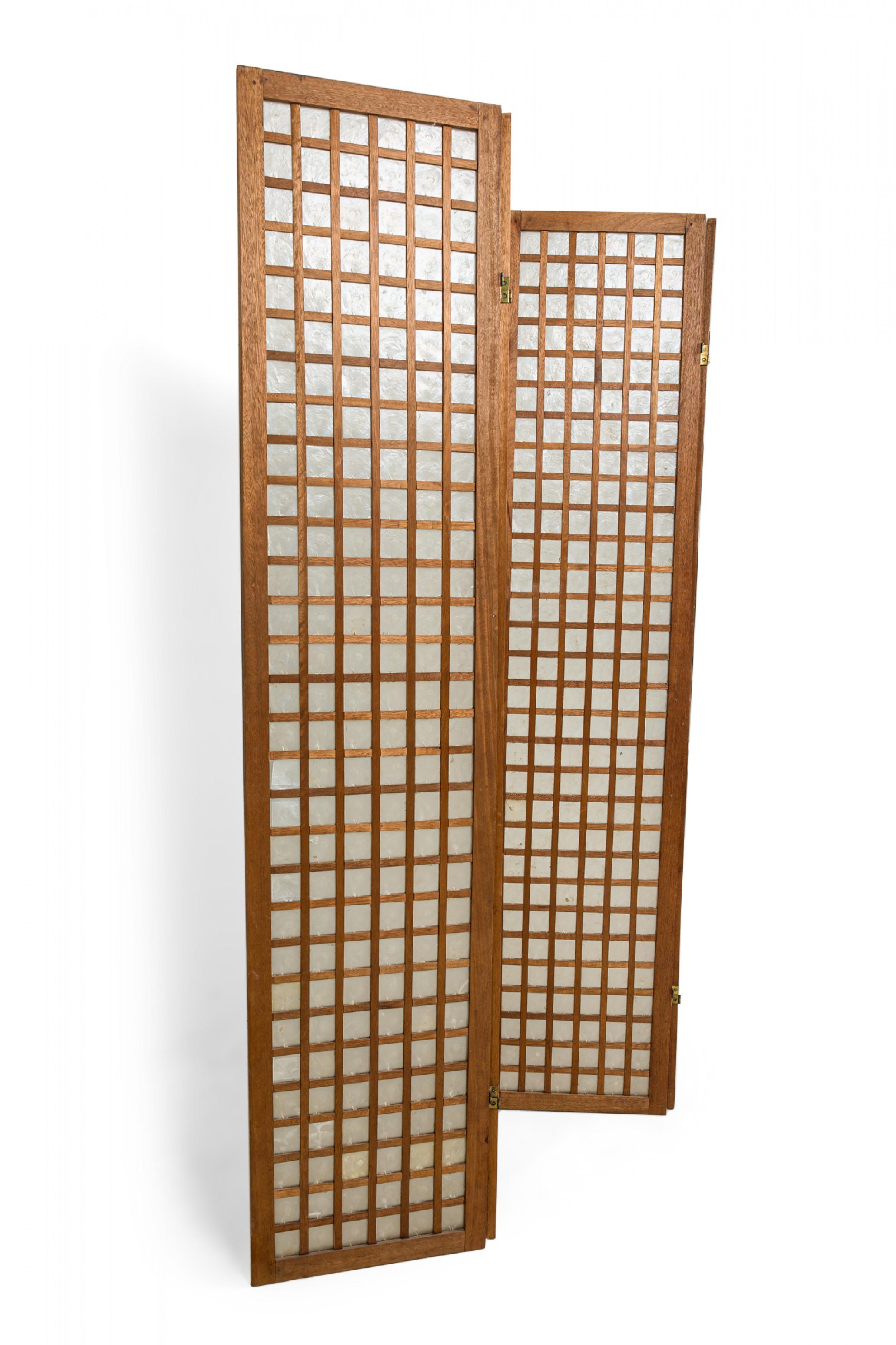 French Mid-Century Modern 4-panel folding screen with a frame constructed from cerused wood in a grid pattern centering square mother of pearl panels.
 

 Separation in frame, cracks and losses to mother of pearl insets.

