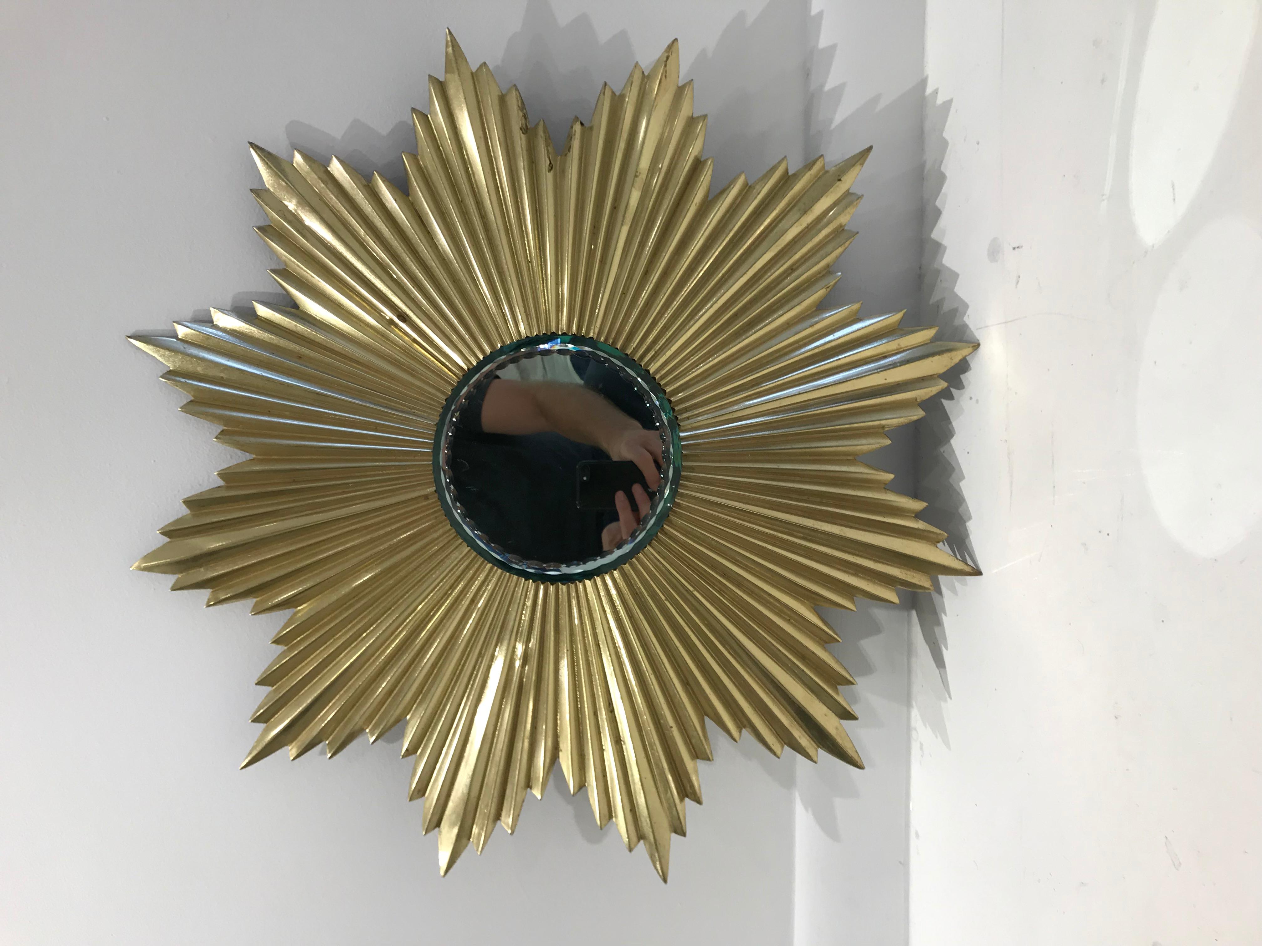 French Mid-Century Modern gilt bronze sunburst mirror.
