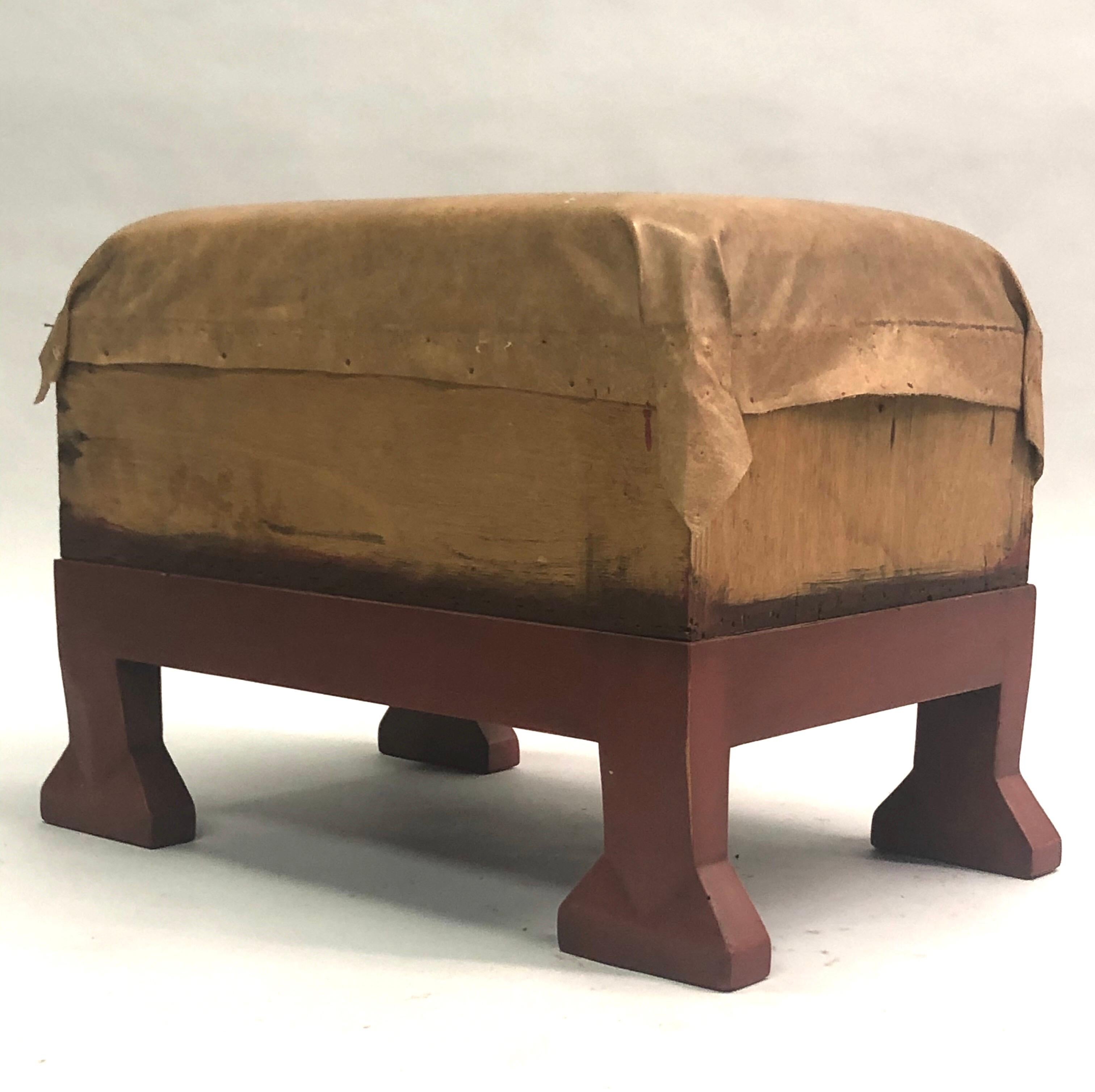A sumptuous French midcentury wood stool, ottoman or bench influenced by Art Deco and the Neo-Egyptian style. The feet and frame is reflective of the modern neoclassical work of Marc Duplantier.

Seat needs to be upholstered.