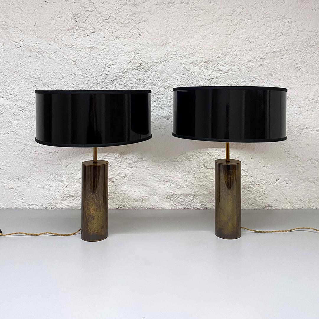 French Mid-Century Modern rare brass table lamps by Jacques Quinet, 1971
Pair of rare table lamps with tubular brass base. The new lampshade are made of glossy black PVC on the outside and gold on the inside.
Project by Jacques Quinet,