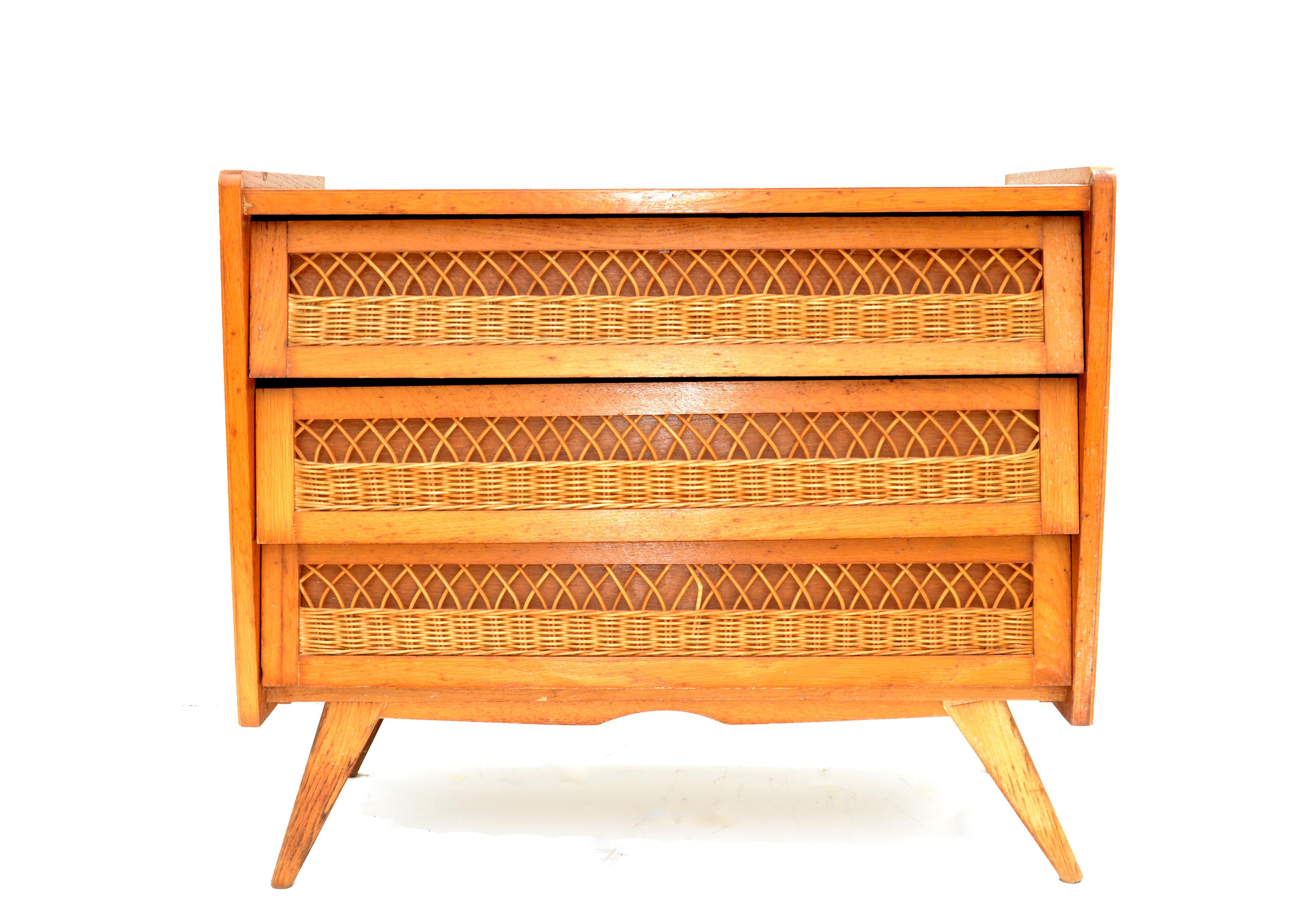 Beautiful French Mid-Century Modern rattan and wood commode dresser 
Three drawers with rattan accent on the front.
 