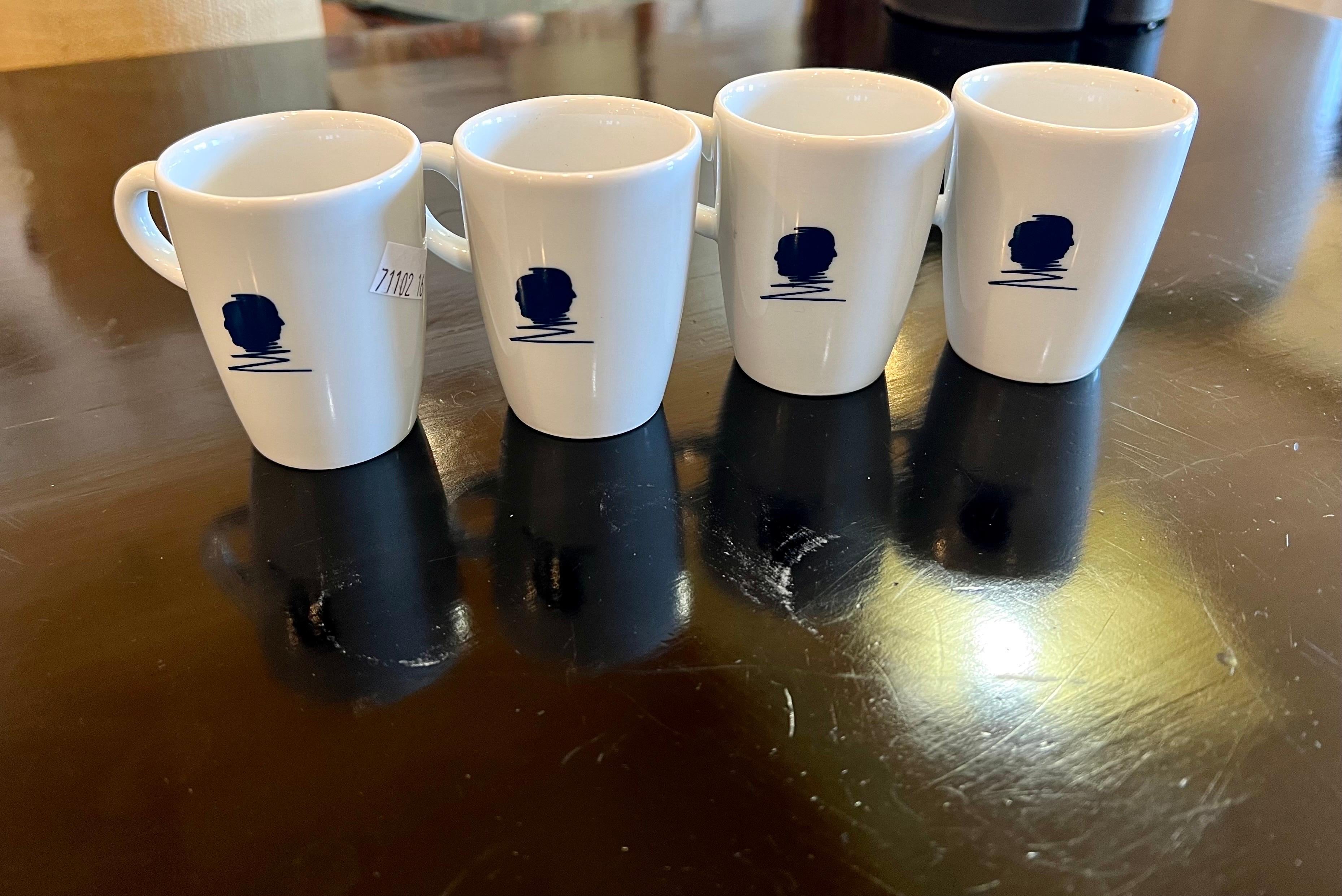 Beautiful set of 4 Espresso cups very rare made in France like new condition, with a plastic removable sticker on the side and nice logo, excellent condition no chips or cracks.