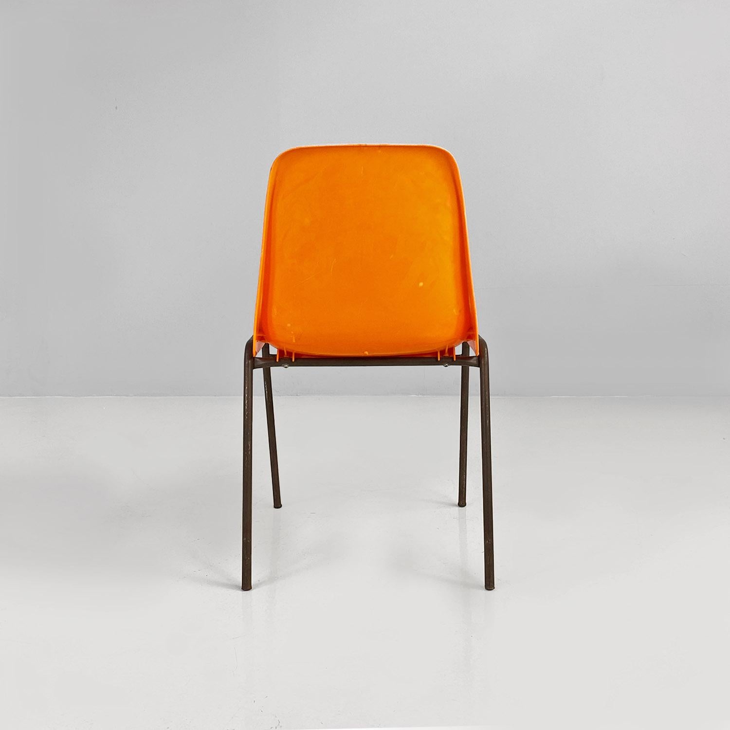 Metal French mid-century modern stackable orange plastic chairs, 1960s For Sale