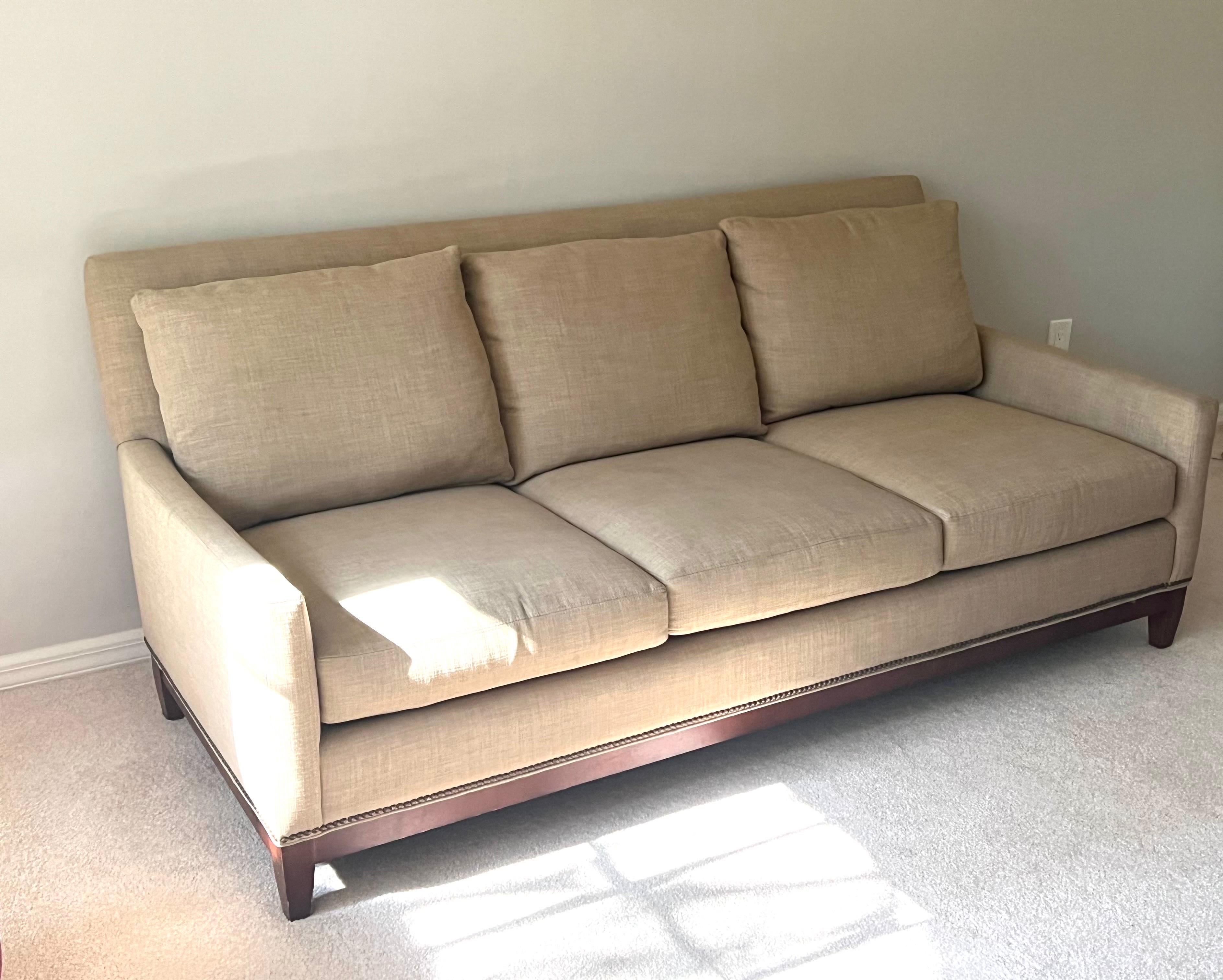 Sober and Elegant French Mid-Century Modern Sofa / Couch in the style of France's most important 20th Century designer, Jean Michel Frank. The 3 seat sofa has a timeless, perfectly balanced form and pure lines and is consistent with Frank's