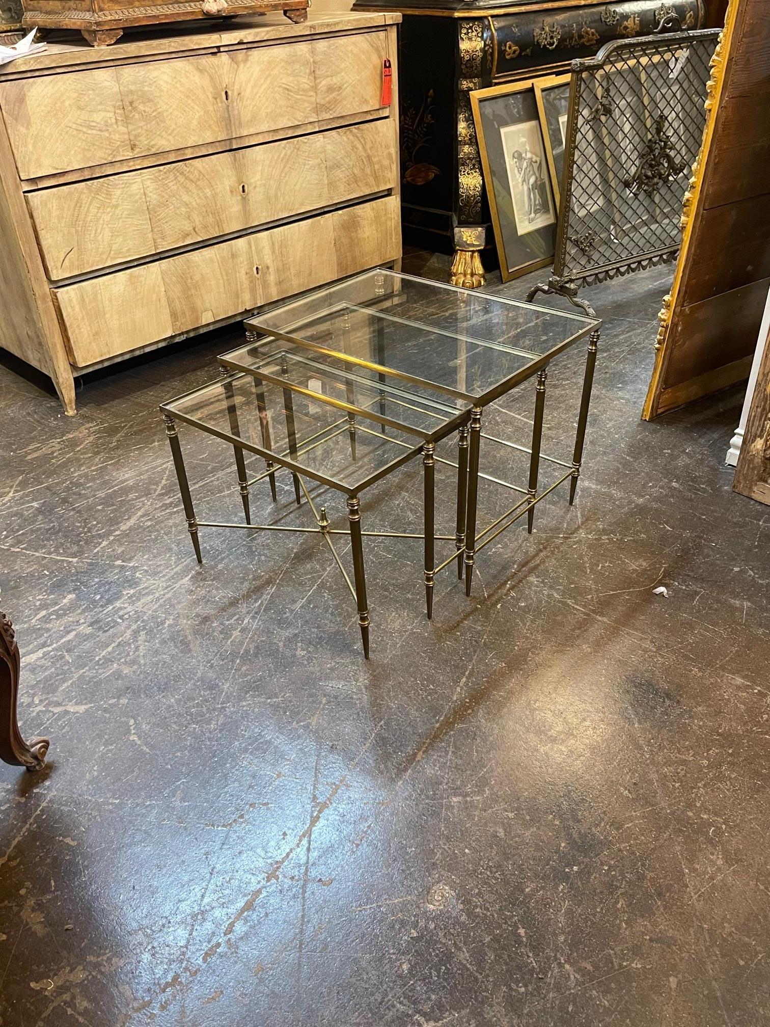Set of French mid-century brass Directoire' style nesting tables, Circa 1960. A fine addition to any home.