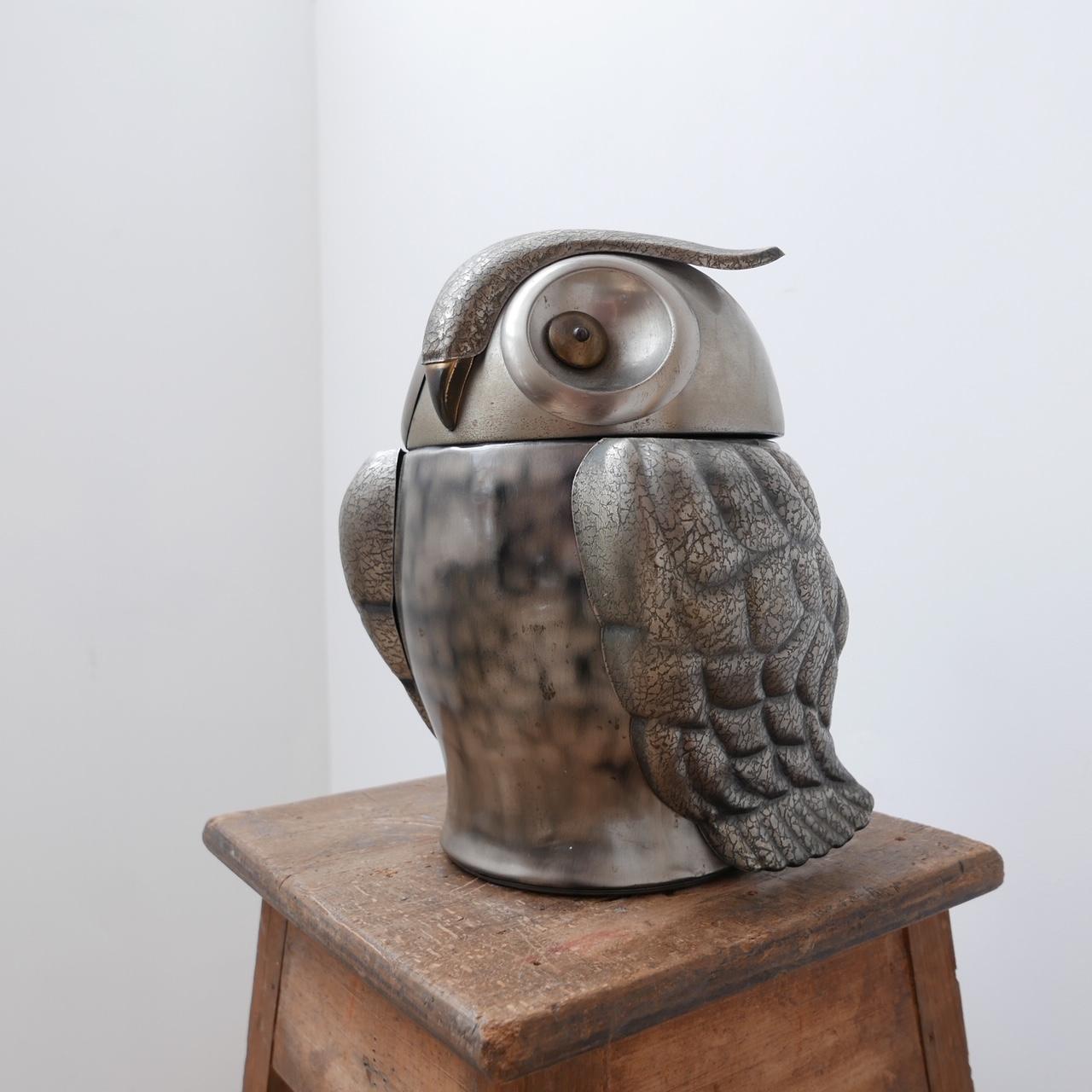 A French ice bucket in the form of an owl. 

Brutalist style. 

France, c1970s. 

The head opens up. Some internal wear commensurate with age but generally good condition. 

Dimensions: 20 D x 25 W x 33 H in cm. 

Delivery: POA.

 