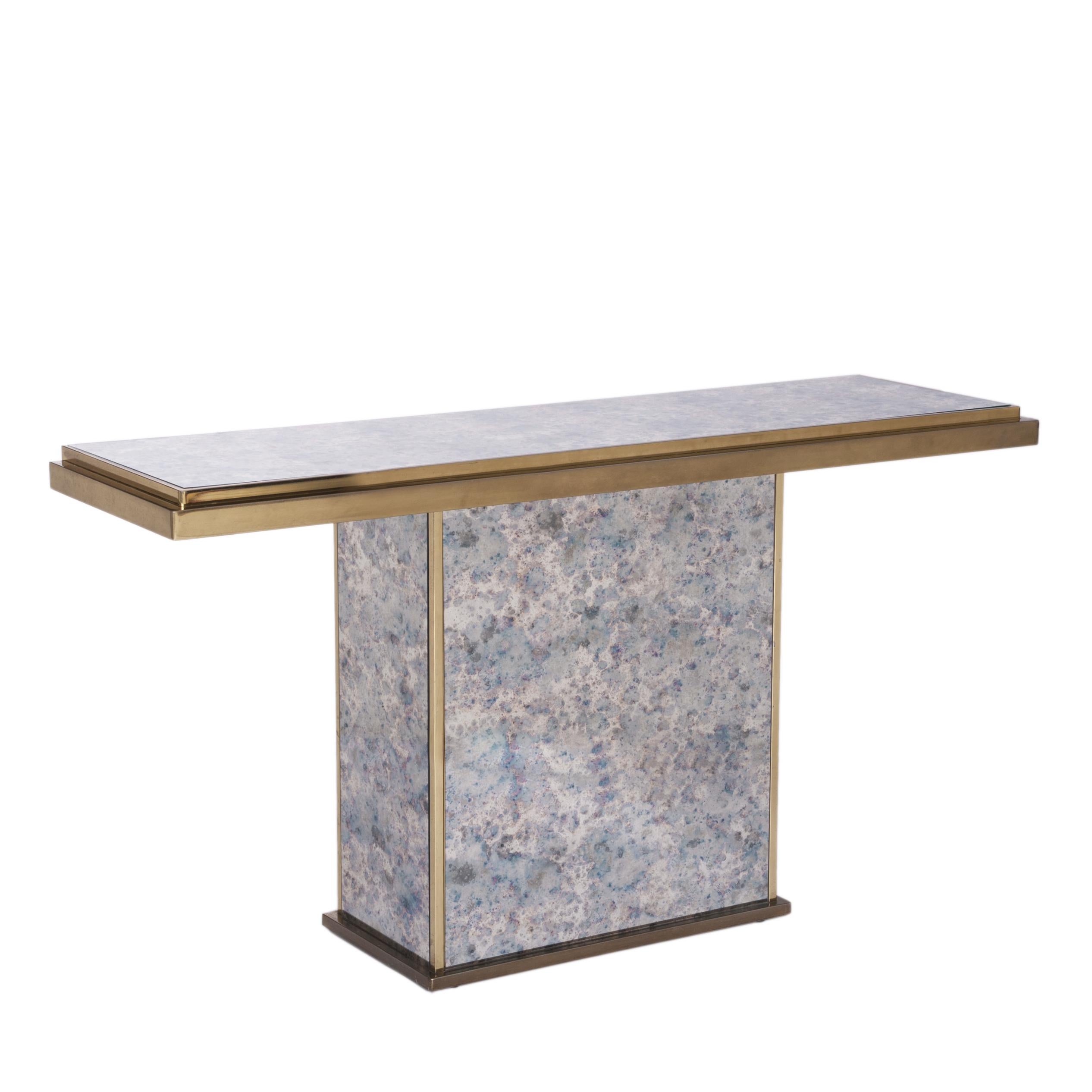 Elegant, straight-lined console table spotty mirrored surface in purple-blue-grey-bronze color.
Measures: Moulded brass table frame (3.0cm), the foot is brass bordered, too (1.5cm) the brass socle measures 2.0cm.
 
