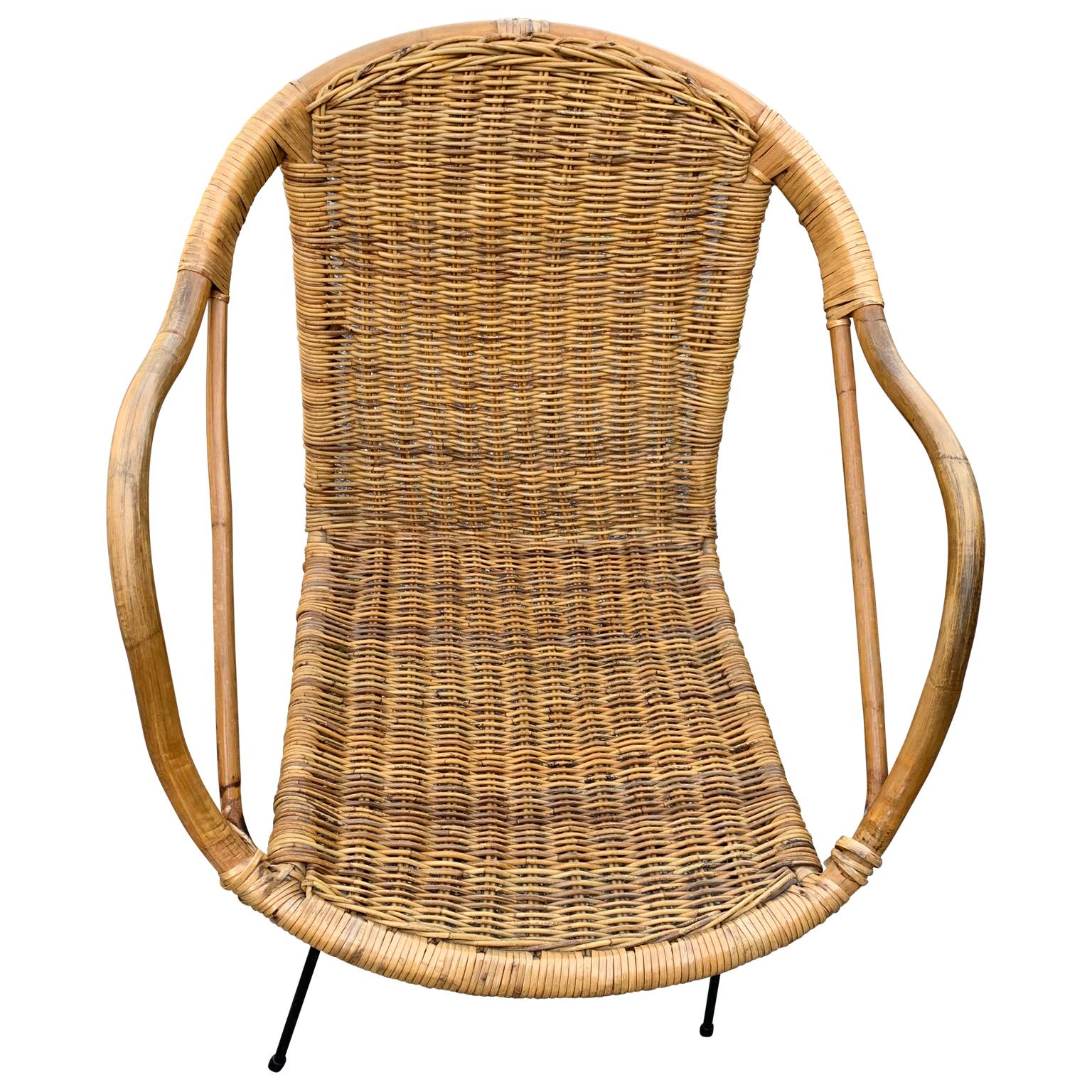 Vintage French rattan garden armchair, circa 1950.