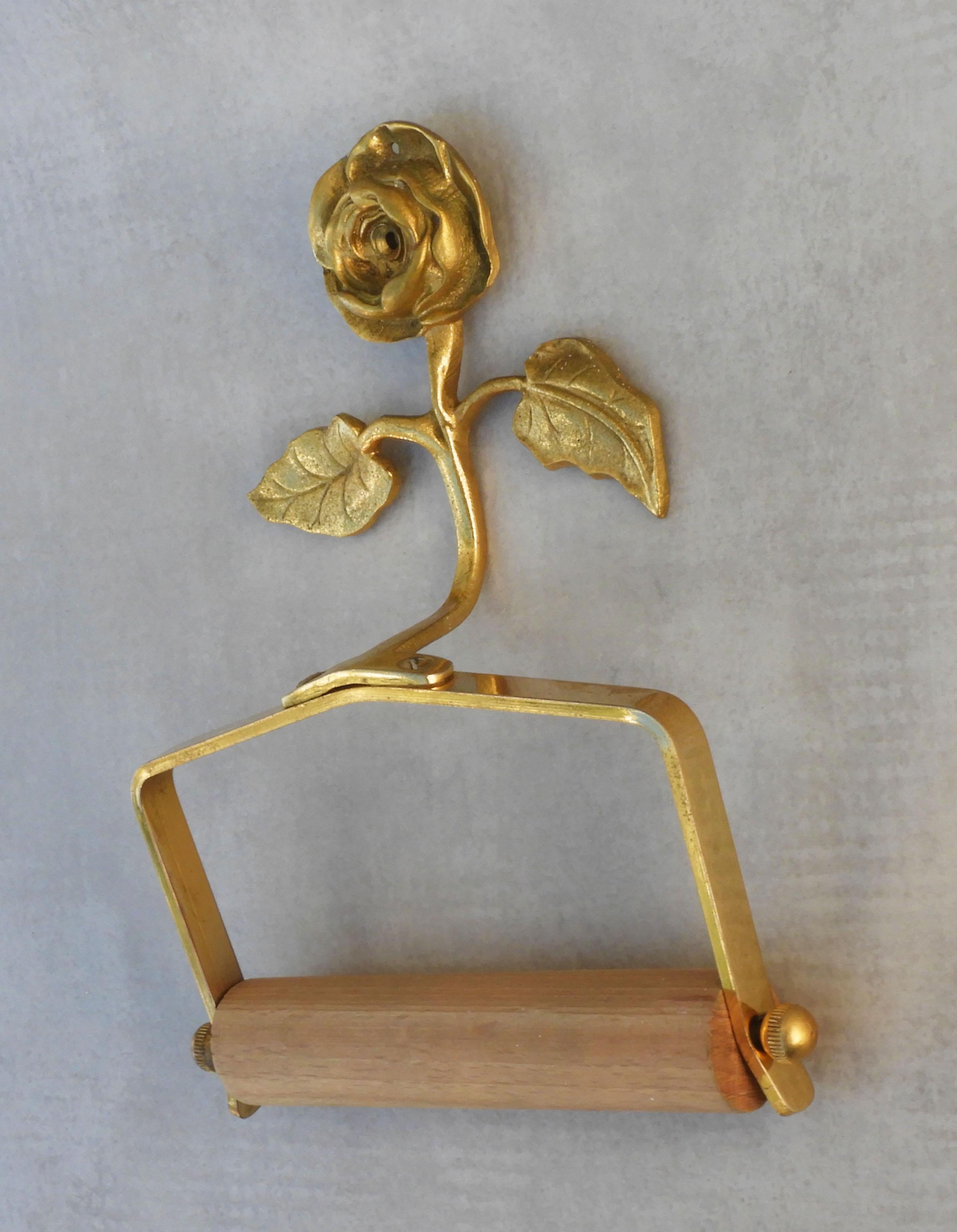 Charming French mid-century rose toilet paper holder in gilded brass C1950.   Part of a selection of bathroom accessories and wall light sconces available in the same style  - please see our other listings. 
In good vintage condition with only light