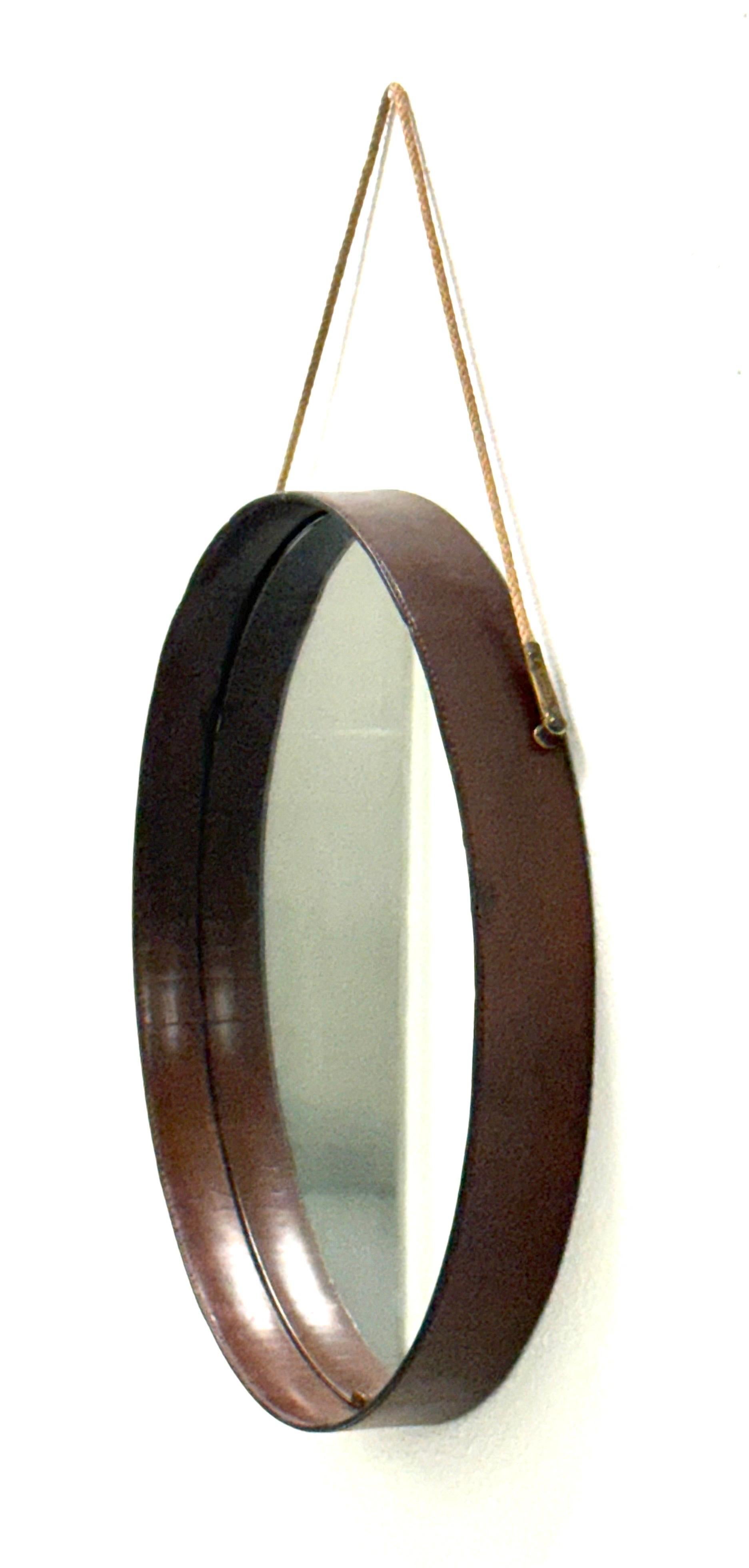 Brass French Mid-Century Round Stitched Dark Brown Leather Mirror, Jacques Adnet, 1955 For Sale
