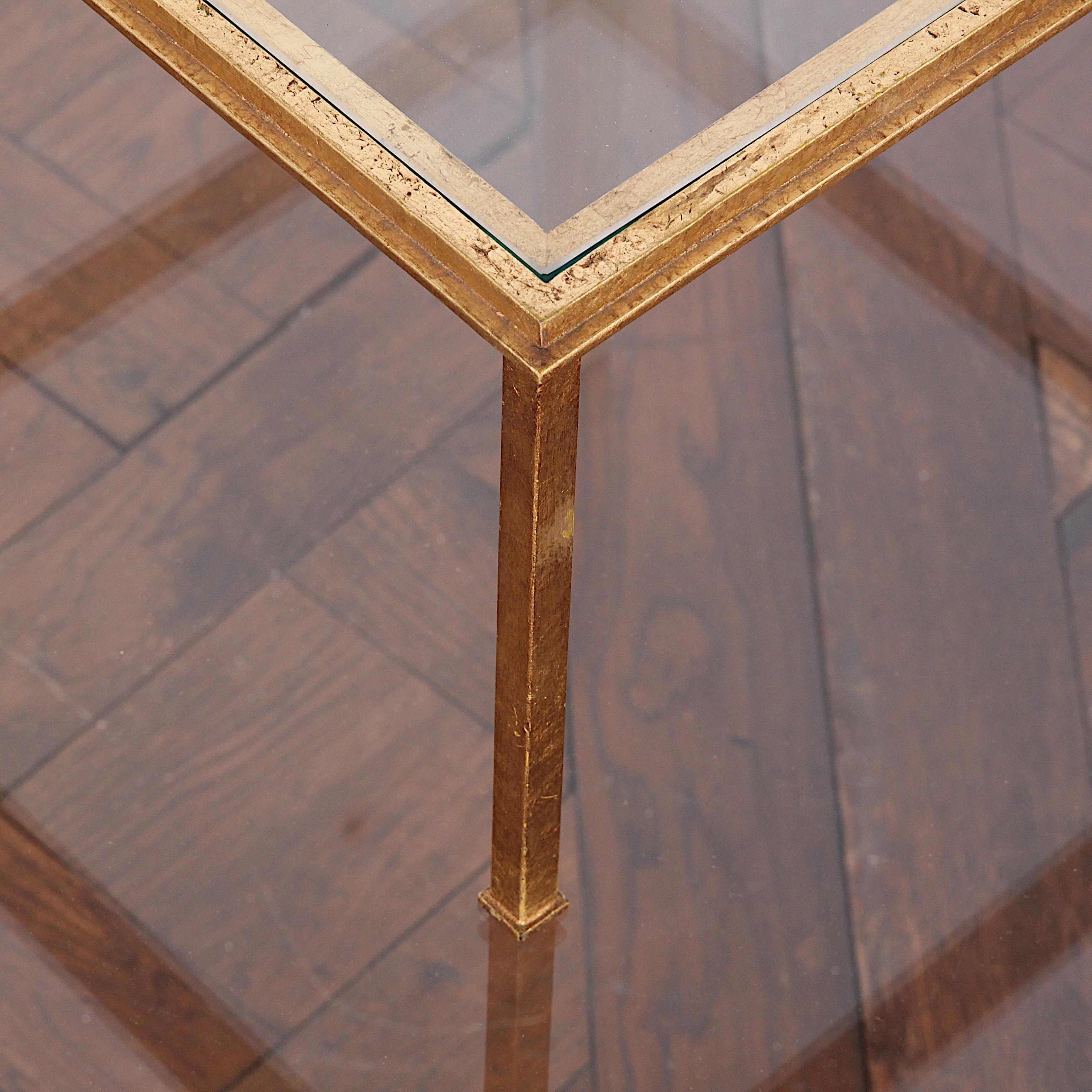 Gold gilded bronze Mid-Century Modern side table (two levels) from Paris. By notable French designer Roger Thibier of the era. Beautiful condition.