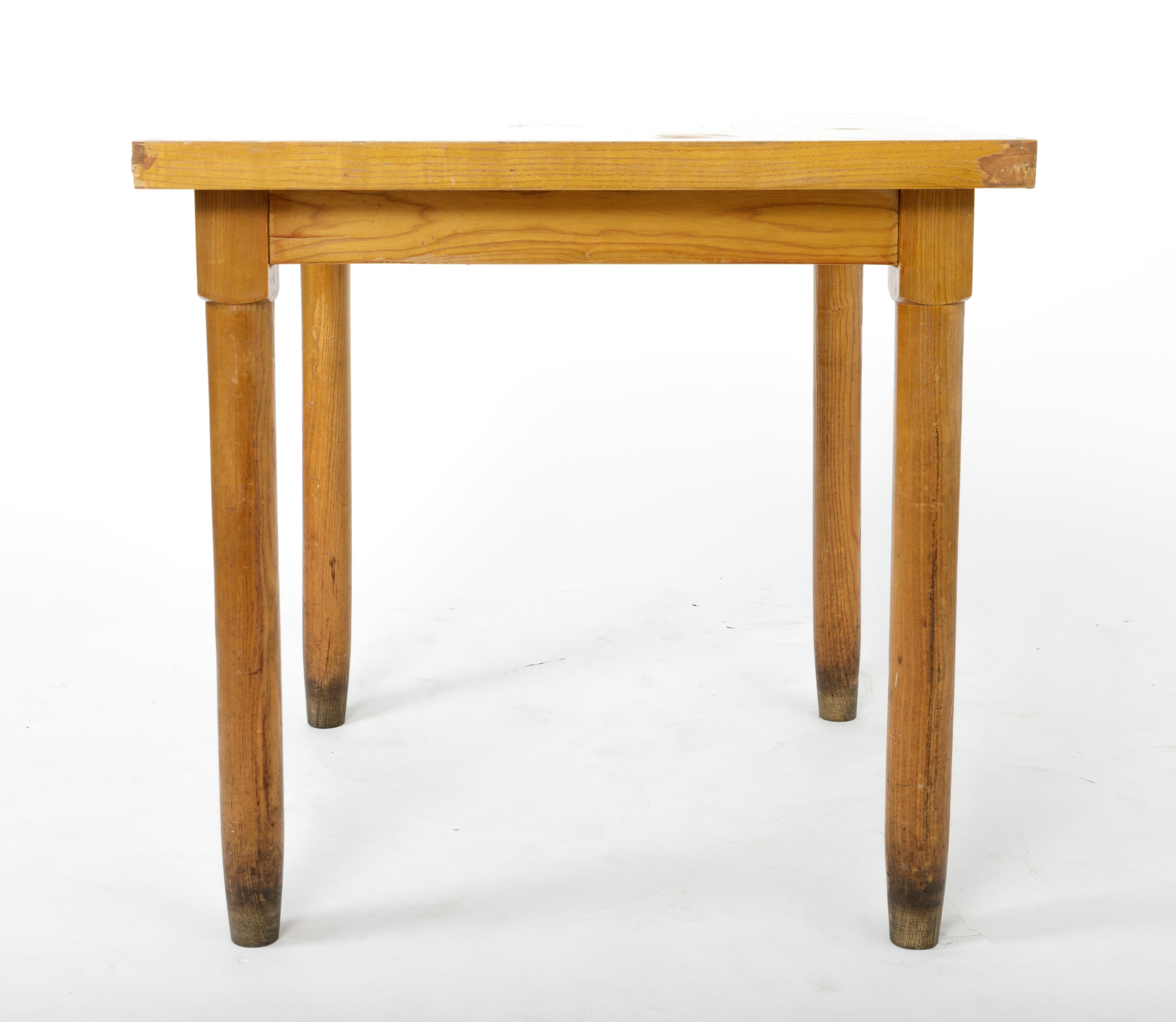 Square dining table in the style of Charlotte Perriand, France, circa 1940s.