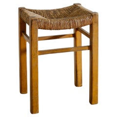 Französischer Hocker aus Stroh und Rattan im Stil von Charlotte Perriand, 1960er Jahre