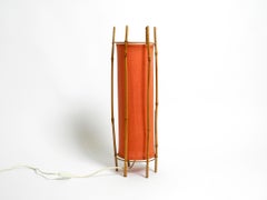 French Mid Century table or floor lamp by Louis Sognot made of bamboo and fabric