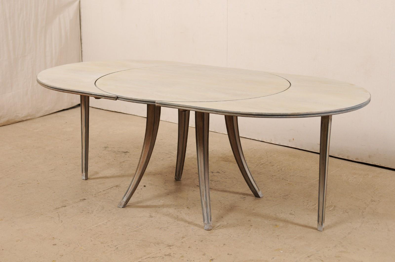 Mid-Century Modern French Mid-century Modern Dining or Center Table, Transitions from Oval to Round