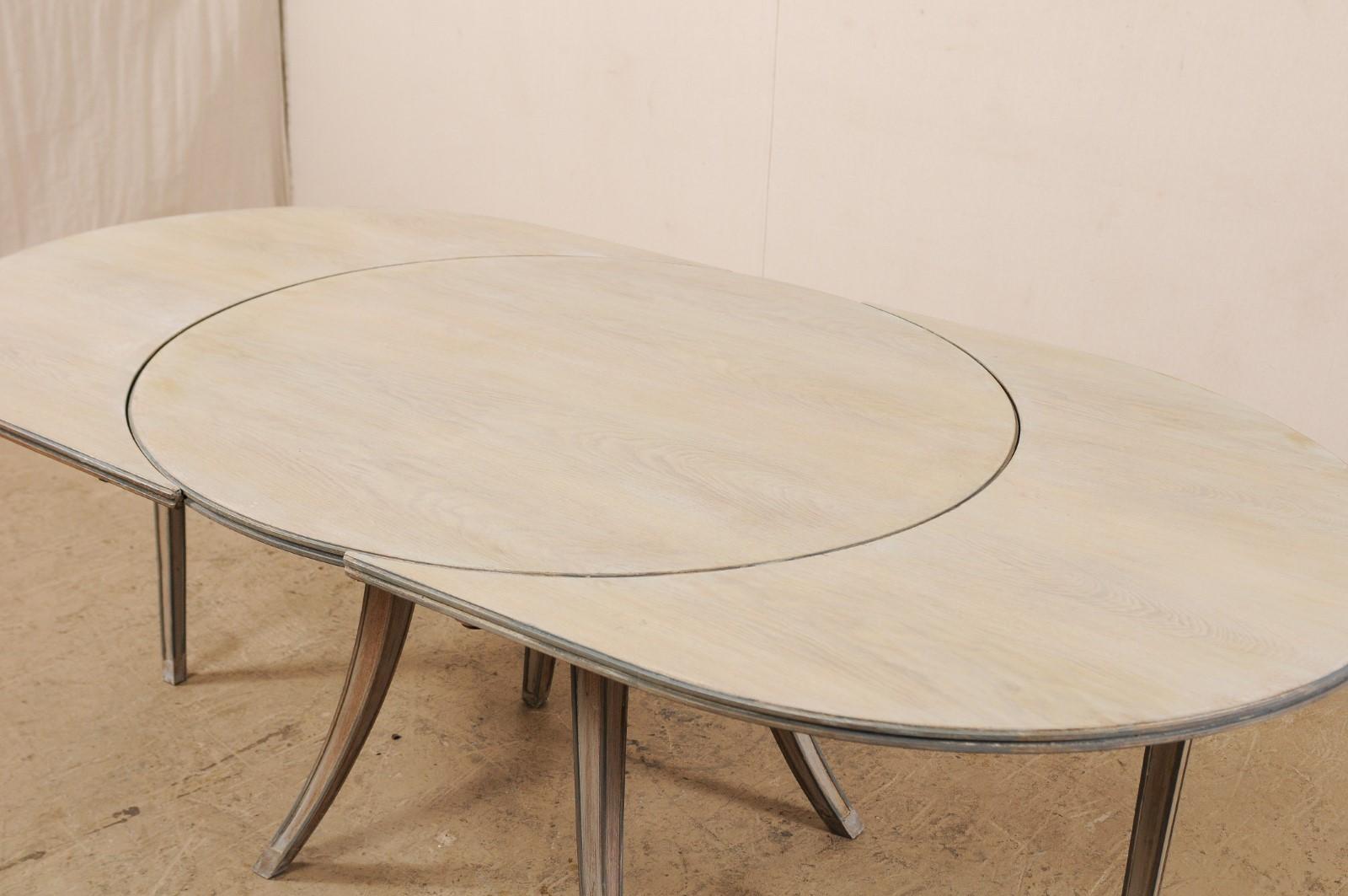 Carved French Mid-century Modern Dining or Center Table, Transitions from Oval to Round