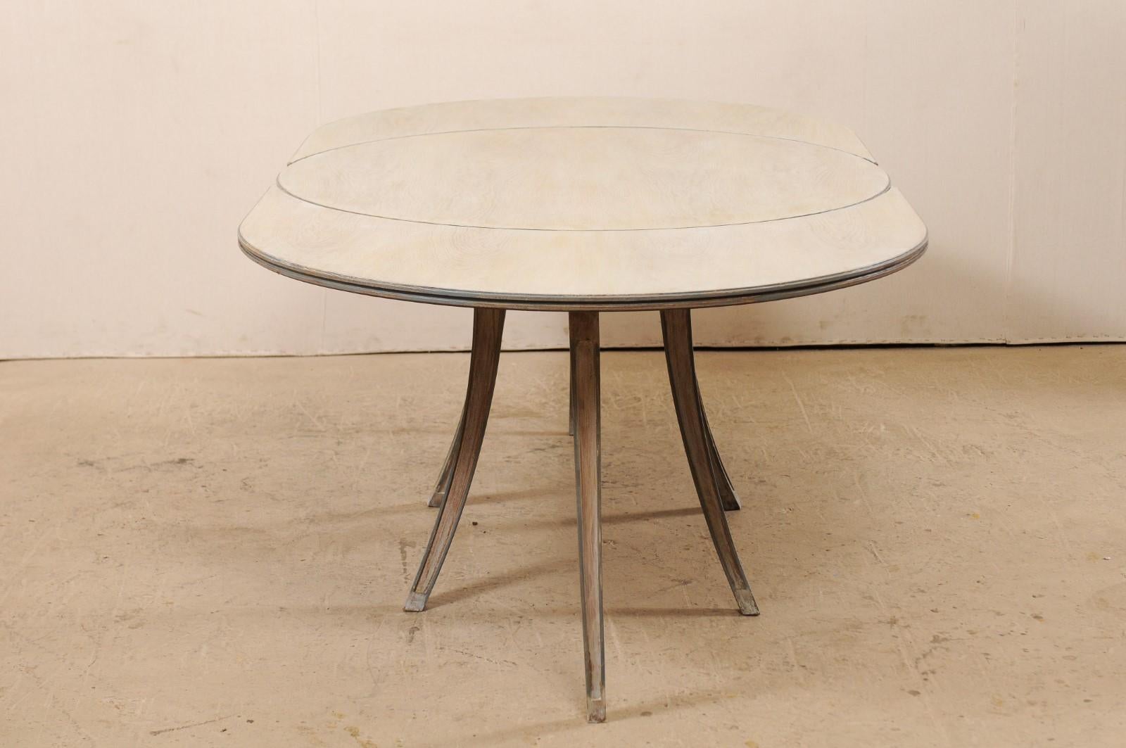 French Mid-century Modern Dining or Center Table, Transitions from Oval to Round In Good Condition In Atlanta, GA