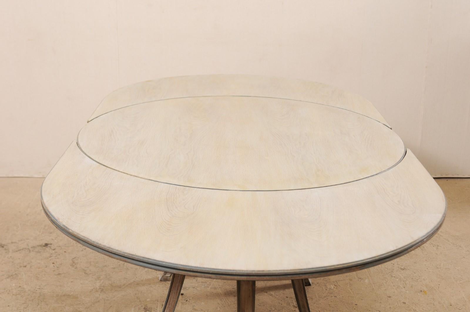 20th Century French Mid-century Modern Dining or Center Table, Transitions from Oval to Round