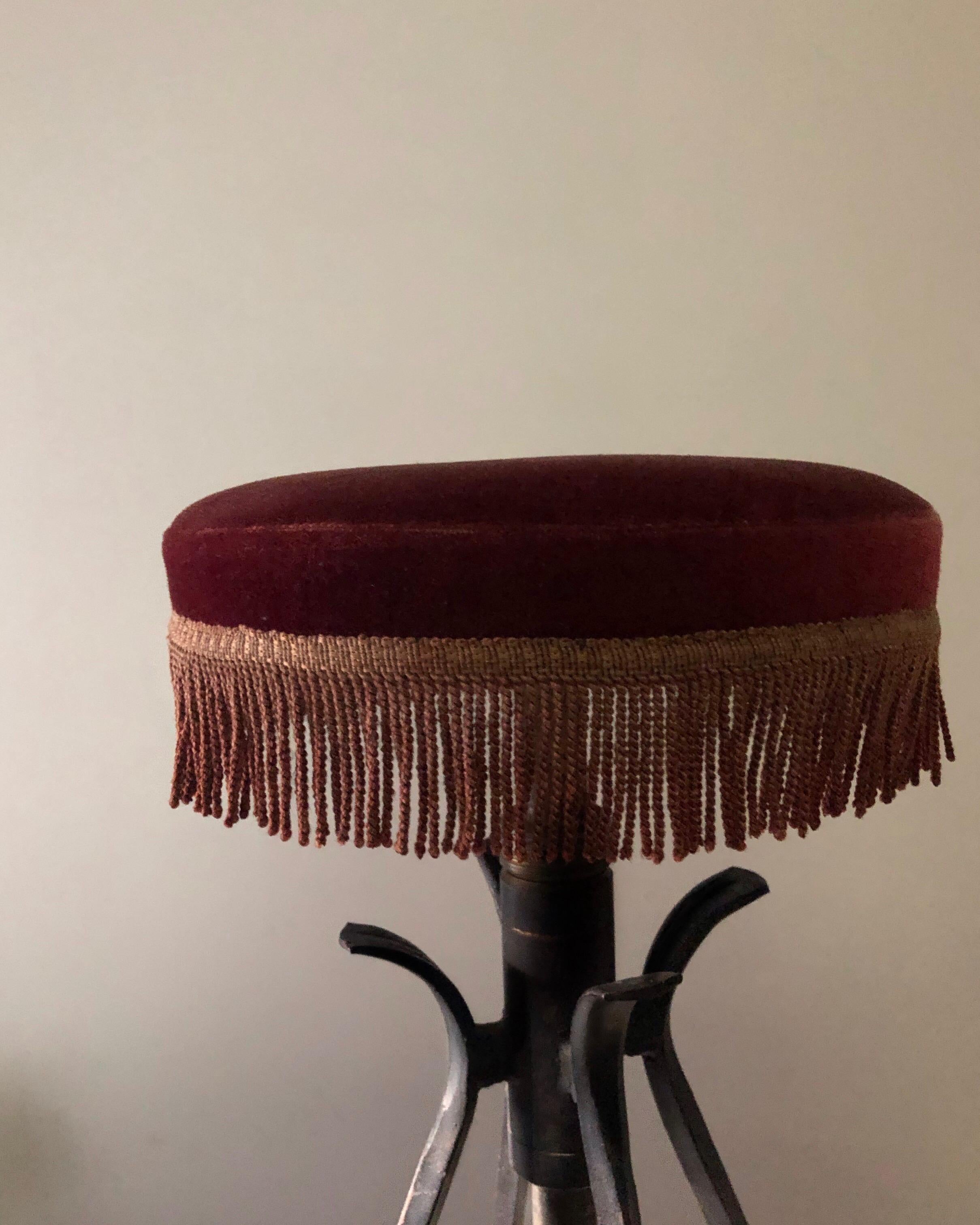 French Mid-Century Wrought Iron Red Velvet Gold Tassel Parisian Stool Pair In Fair Condition In Brooklyn, NY