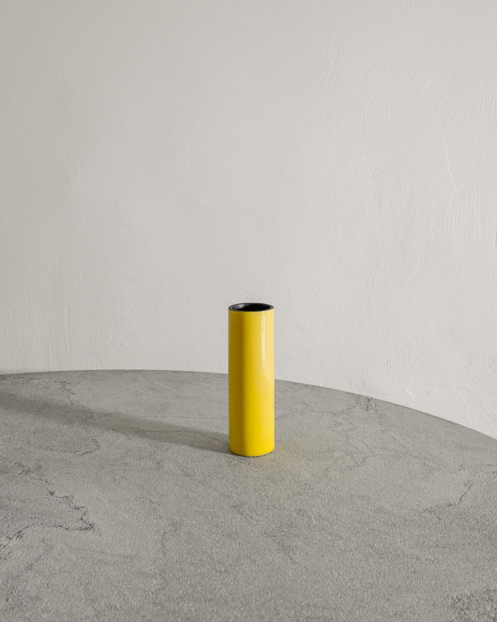 Rare French mid century cylinder ceramic vase by Georges Jouve in one of his iconic yellow glaze produced by Ateliers Georges Jouve for Steph Simon Paris France, 1950s. In good original condition and signed by the artist under the base.