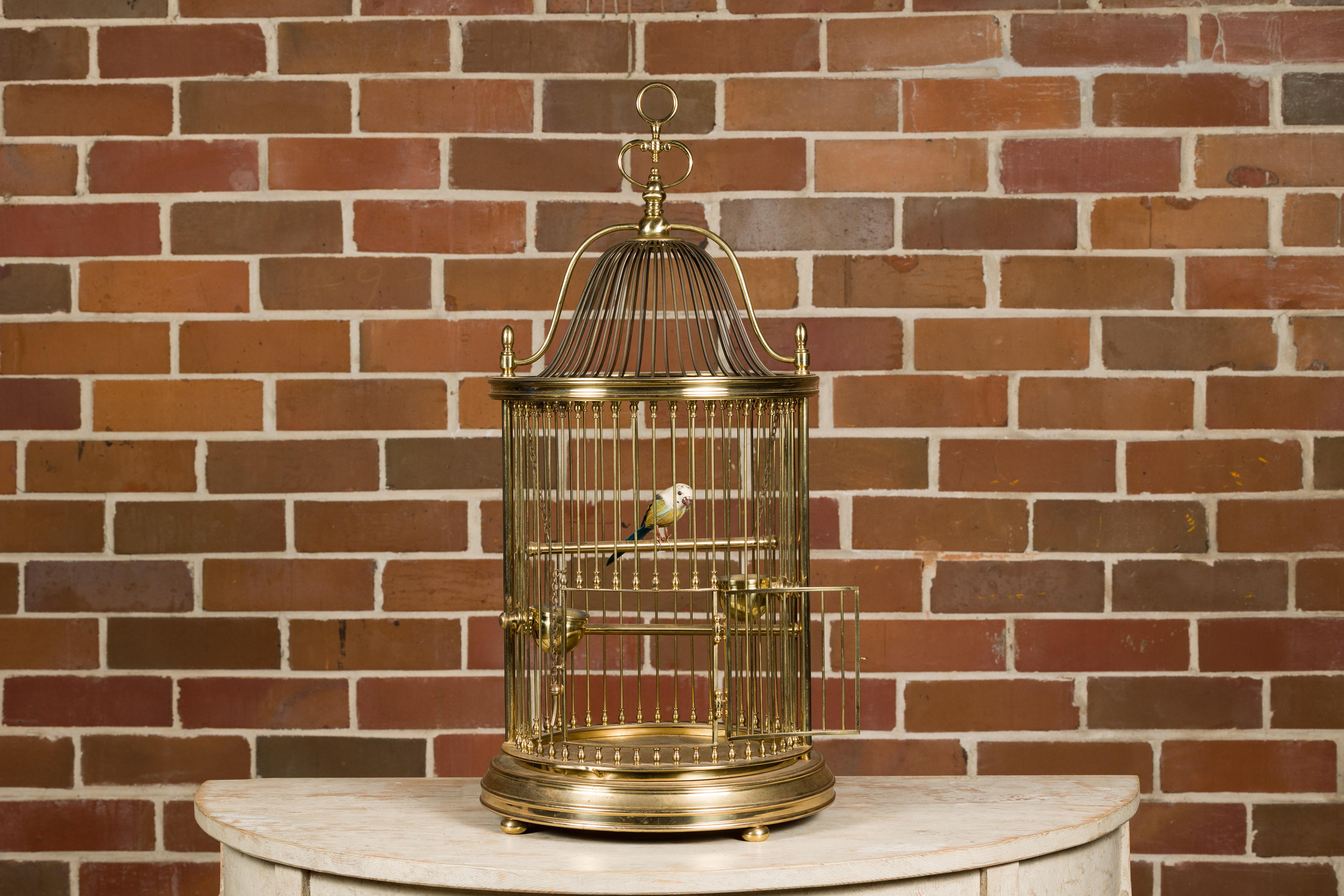 French Midcentury Brass Circular Birdcage with Decorative Bird In Good Condition For Sale In Atlanta, GA