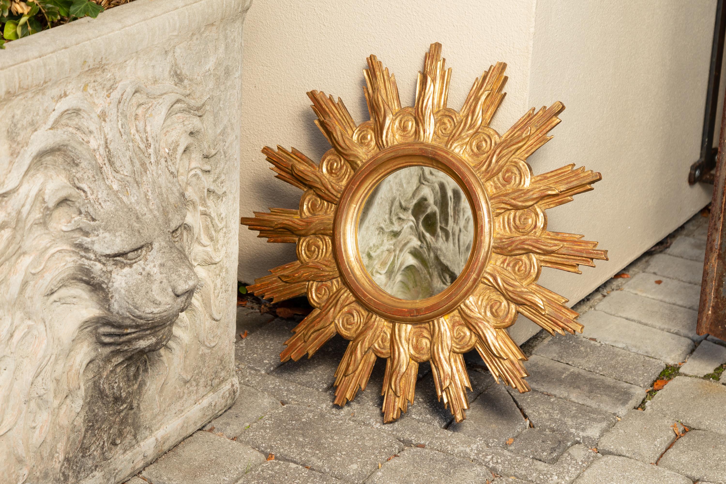 French Midcentury Carved Giltwood Sunburst Mirror with Cloudy Frame For Sale 7