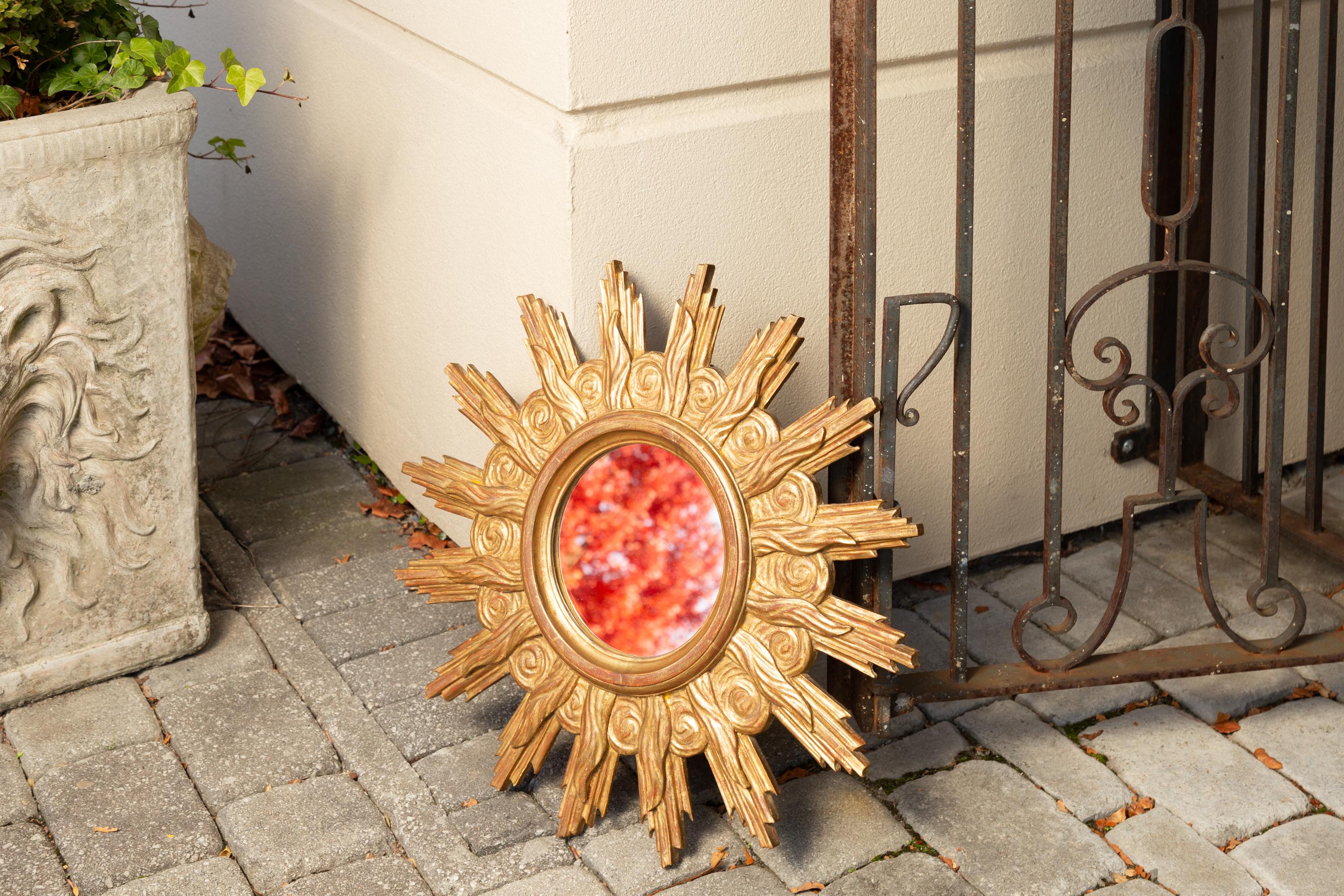 Mid-Century Modern French Midcentury Carved Giltwood Sunburst Mirror with Cloudy Frame For Sale