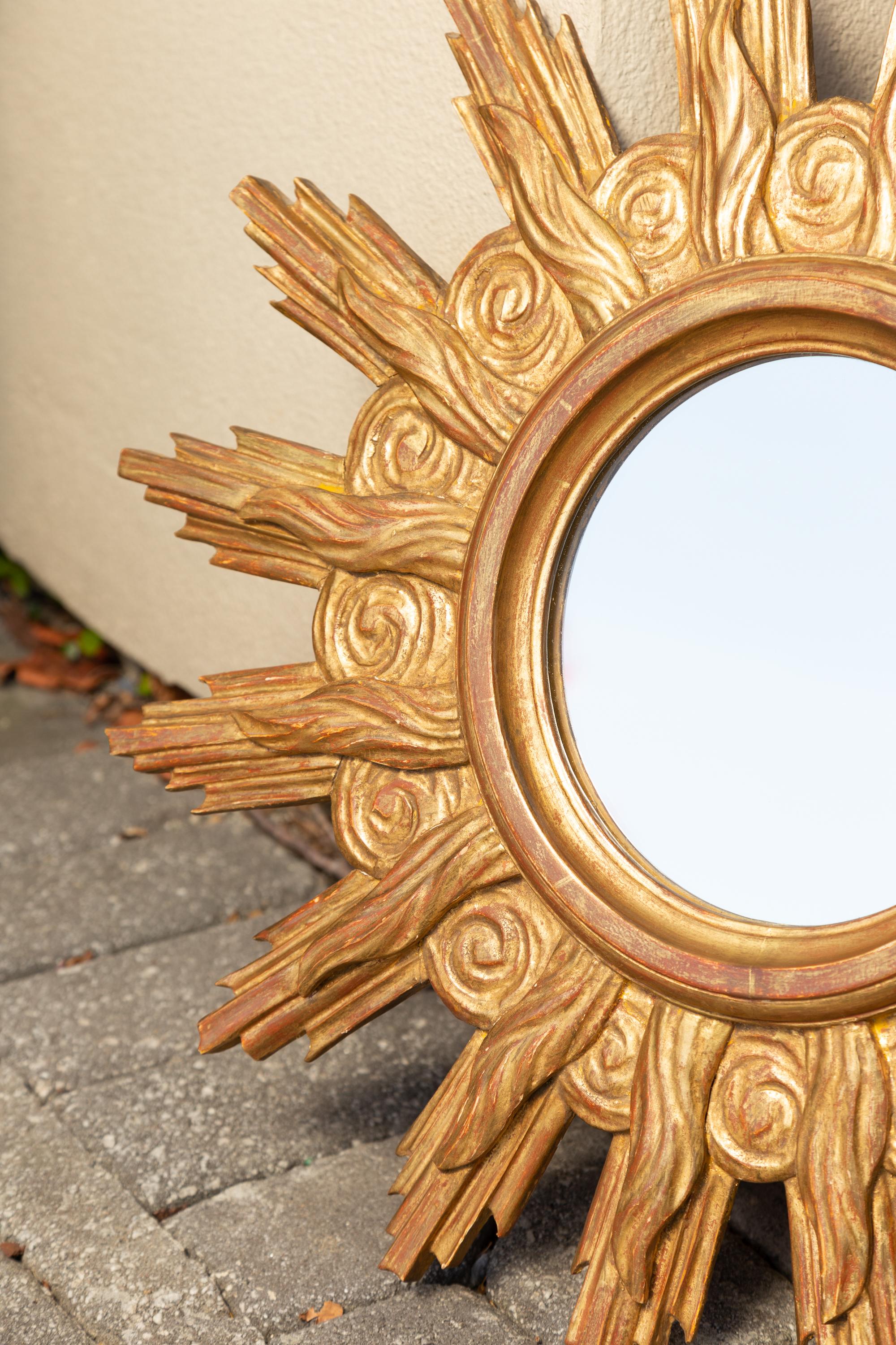 French Midcentury Carved Giltwood Sunburst Mirror with Cloudy Frame For Sale 1