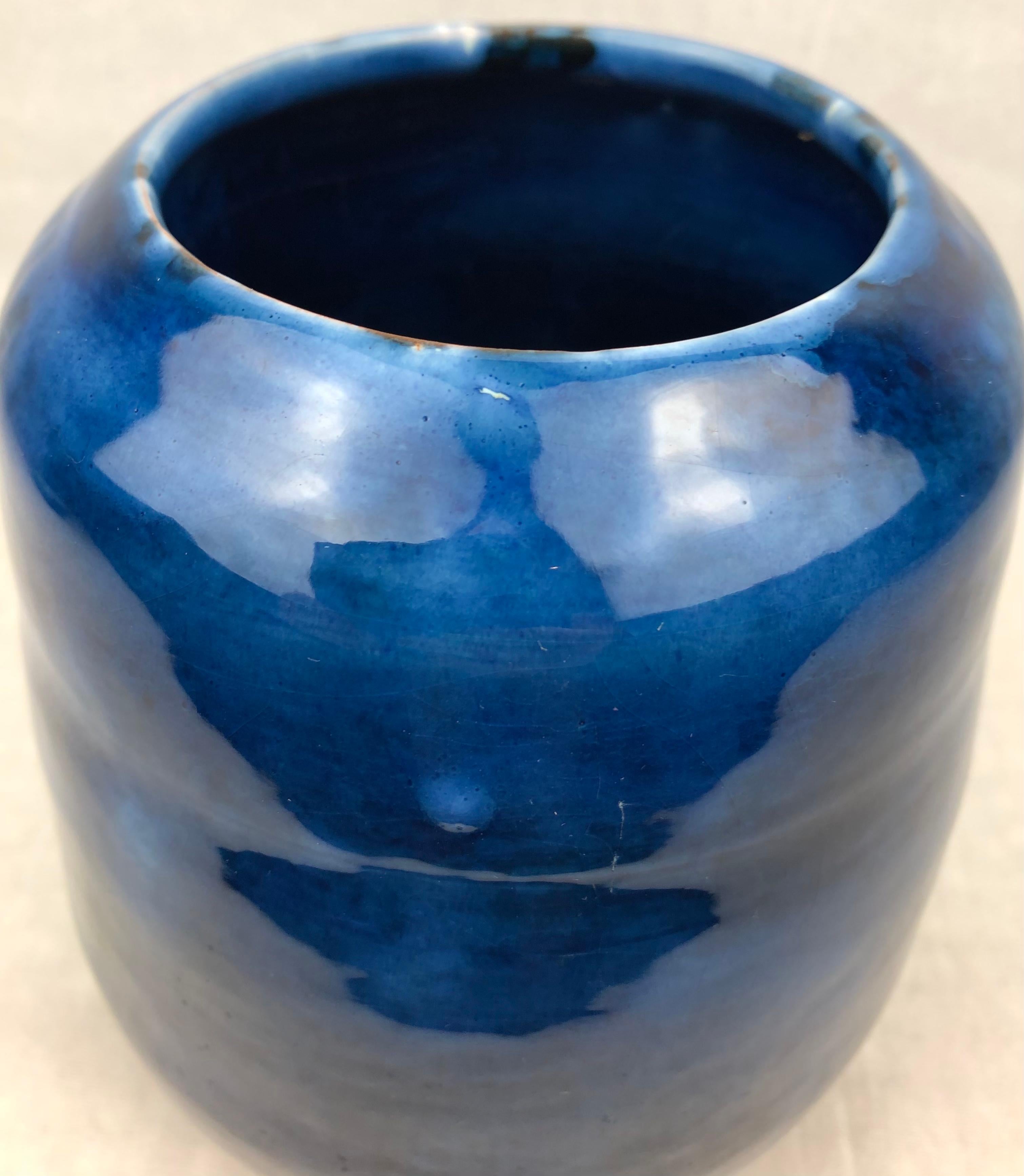 Midcentury French ceramic vase in a stunning cobalt blue color, glazed. 
Signed piece, unknown ceramic artist. 

This gorgeous decorative object will enhance any table, shelf or countertop. 
Very good vintage condition, no visible cracks or chips.
 