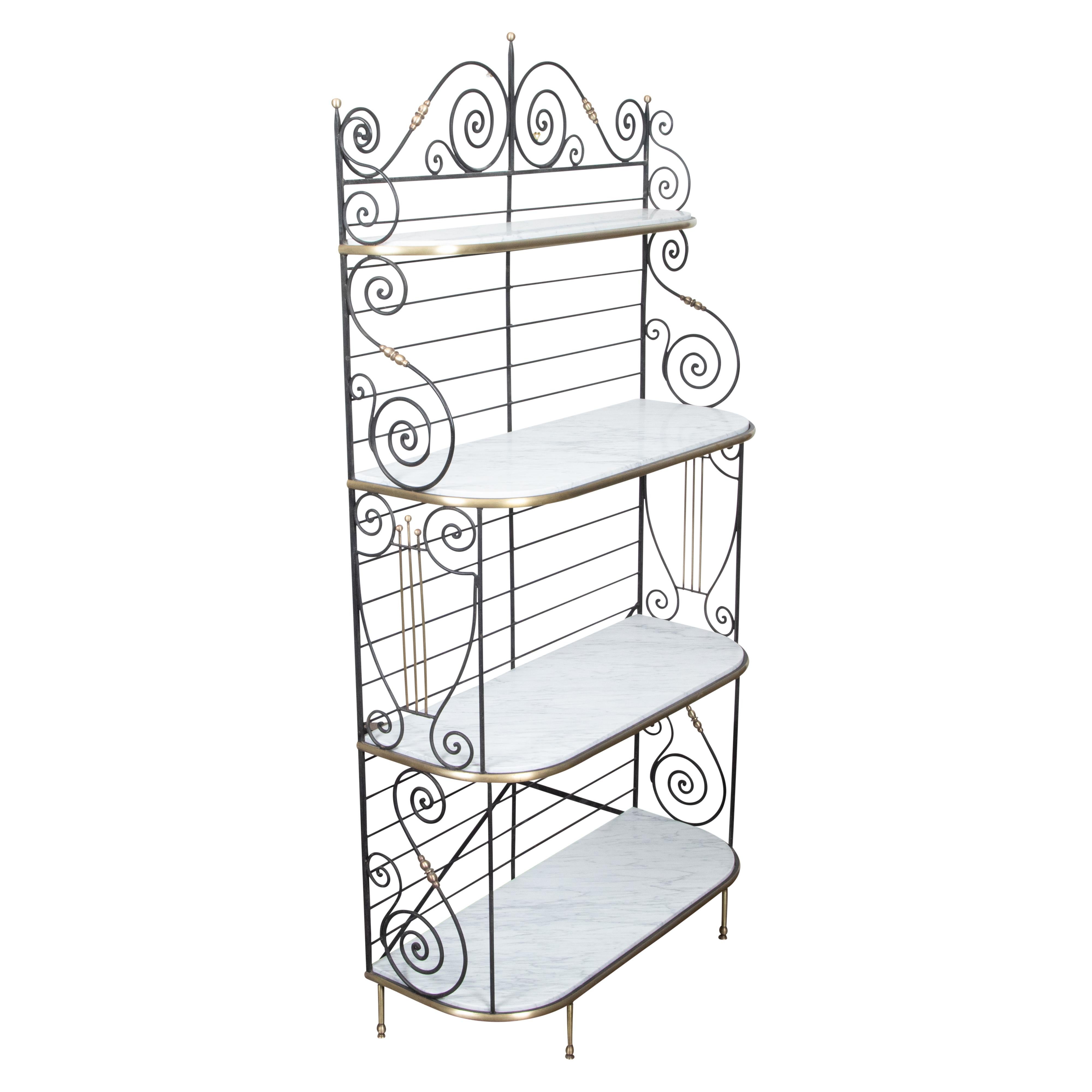 A French vintage iron ‘grille à pain” baker’s rack from the Mid-20th Century, with brass accents, scrolling patterns and new white marble shelves. Created in France during the Midcentury period, this iron rack, called a grille à pain in French, was