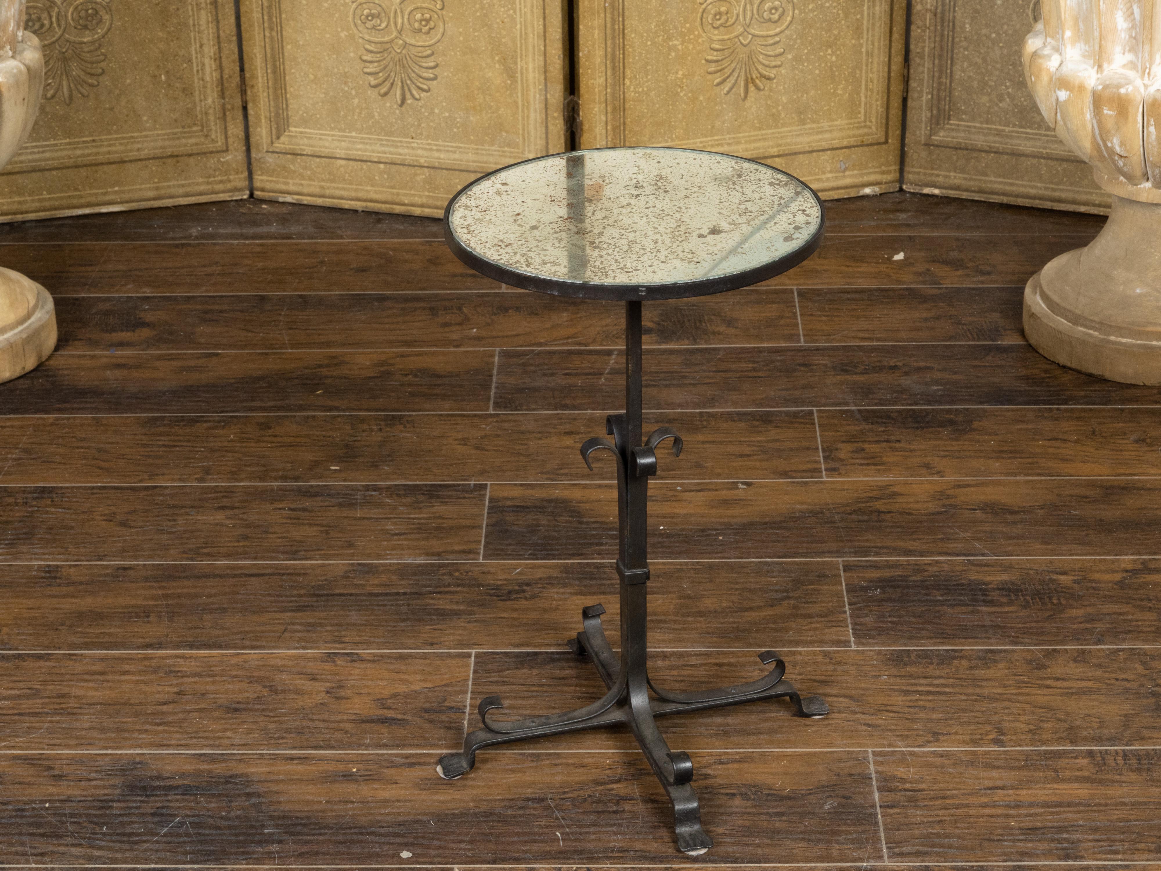 French Midcentury Iron Side Table with Antiqued Mirrored Top and Scrolling Base In Good Condition For Sale In Atlanta, GA