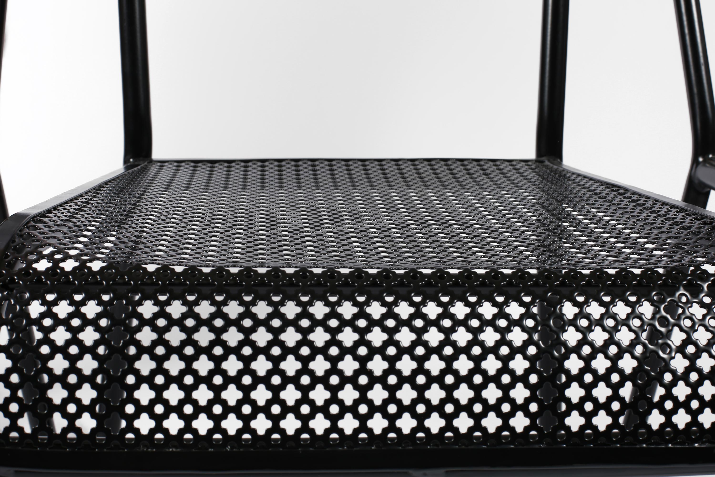 Sold separately. 

A set of four welded and perforated steel ‘Tube’ chairs by Mathieu Matégot (1910-2001), recently finished in a satin black. French, c. 1950.