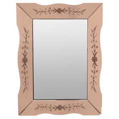 Specchio francese del Medioevo con bordo a rose