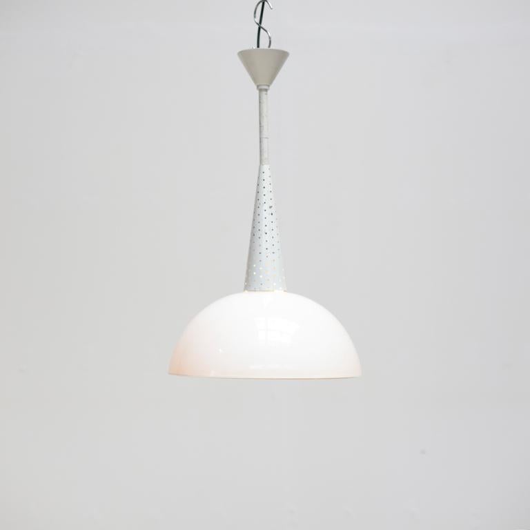 Midcentury pendant by French designer Mathieu Matégot with a white holophene shade and a perforated metal conical shaped down rod.
 