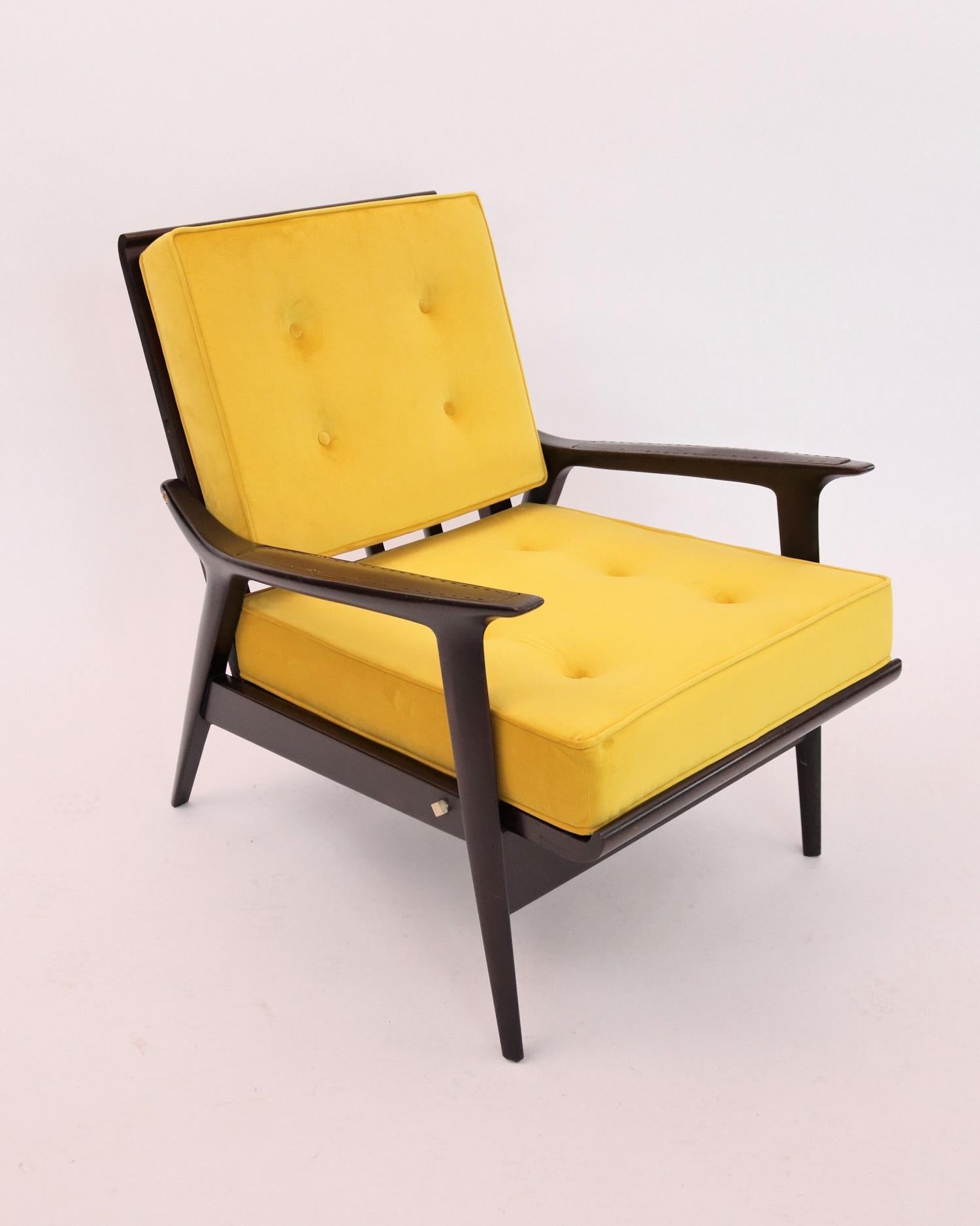 Beautiful recliner armchair made of solid wood with leather inserts on the armrests and two new cushion in canary yellow velvet.
Made in Italy but inspired by the Scandinavian design.
The armchair is adjustable in three positions by using the