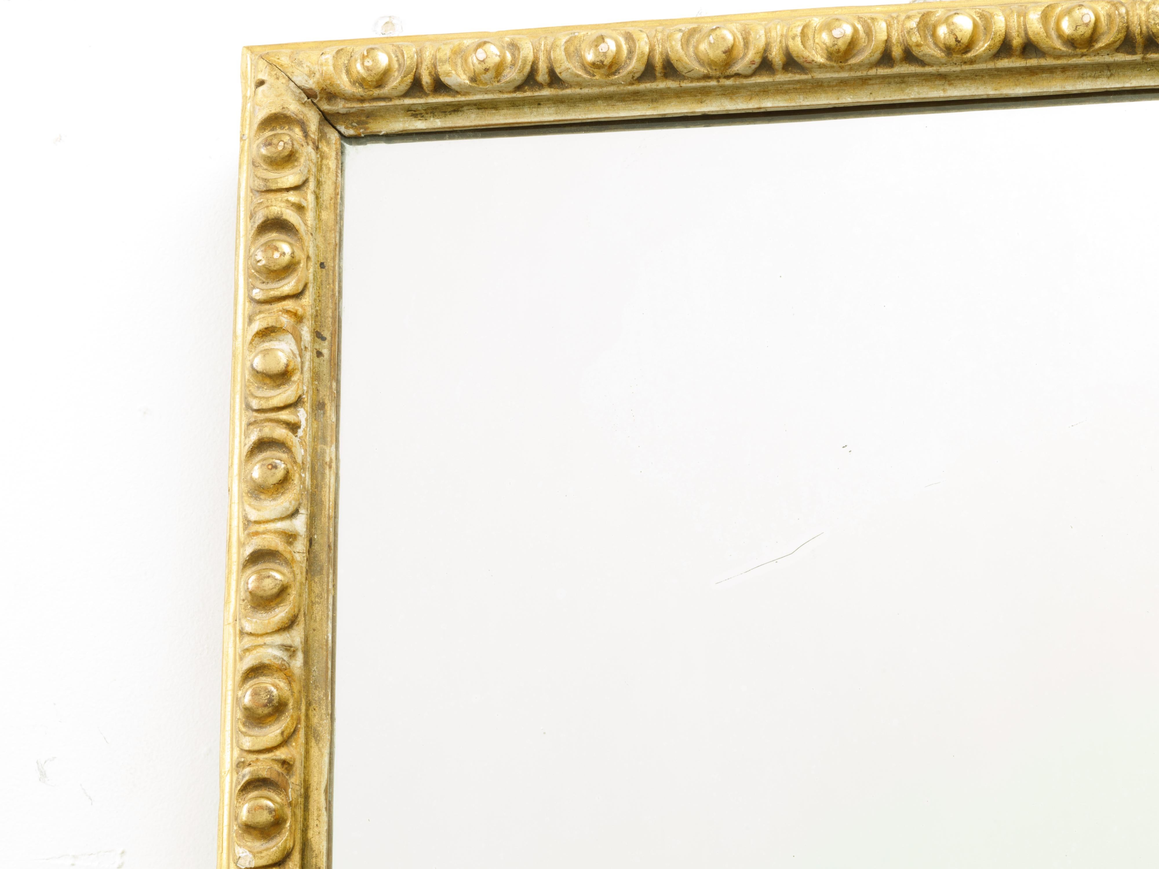 French Midcentury Rectangular Giltwood Mirror with Carved Ovoid Motifs In Good Condition For Sale In Atlanta, GA