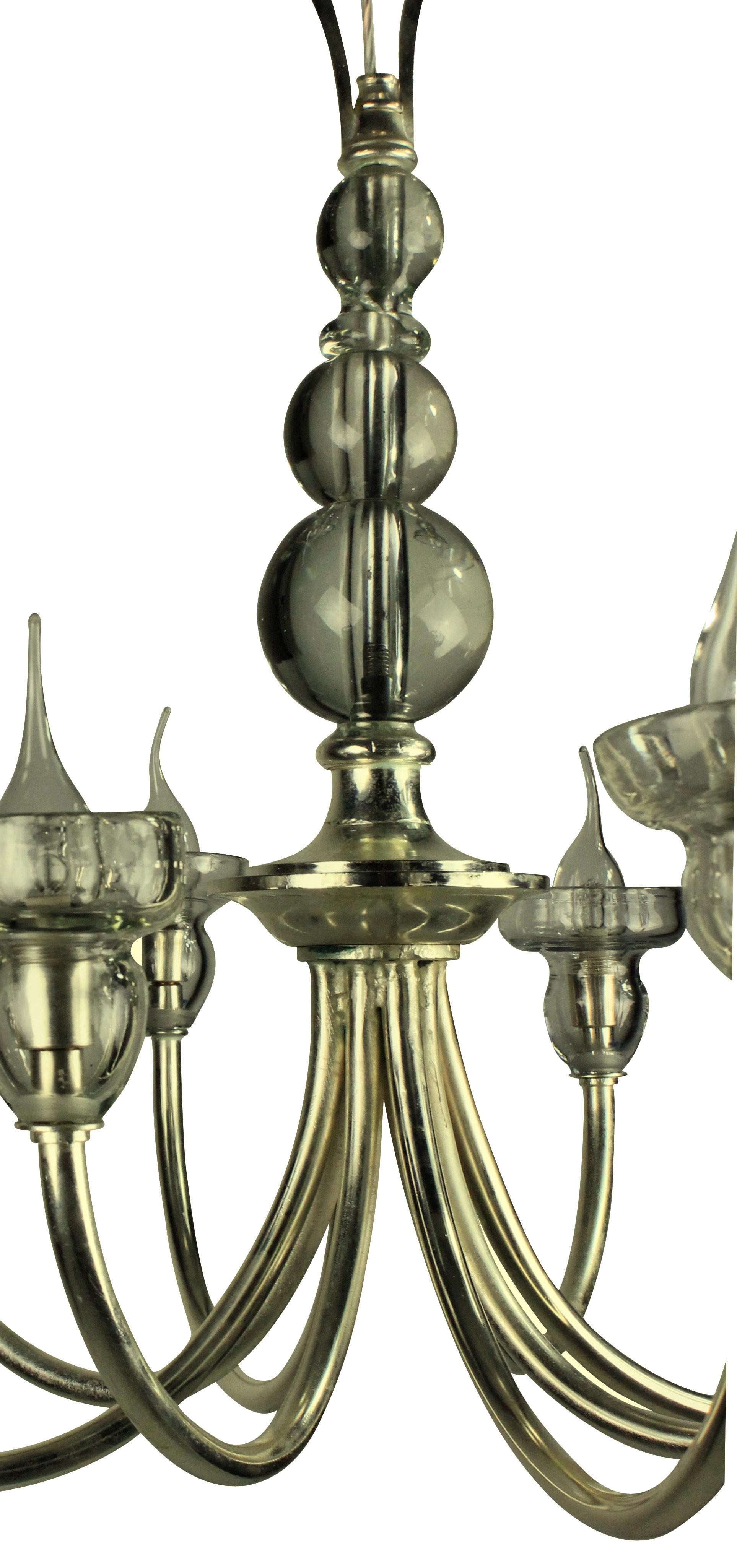 A French chandelier of interesting design in silvered metal with good quality glass detailing, with a spherical centre stem and drip sconces.