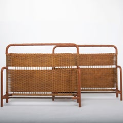 Sofá-cama francés de mediados de siglo de acero, cuero de imitación de bambú y ratán, Jacques Adnet