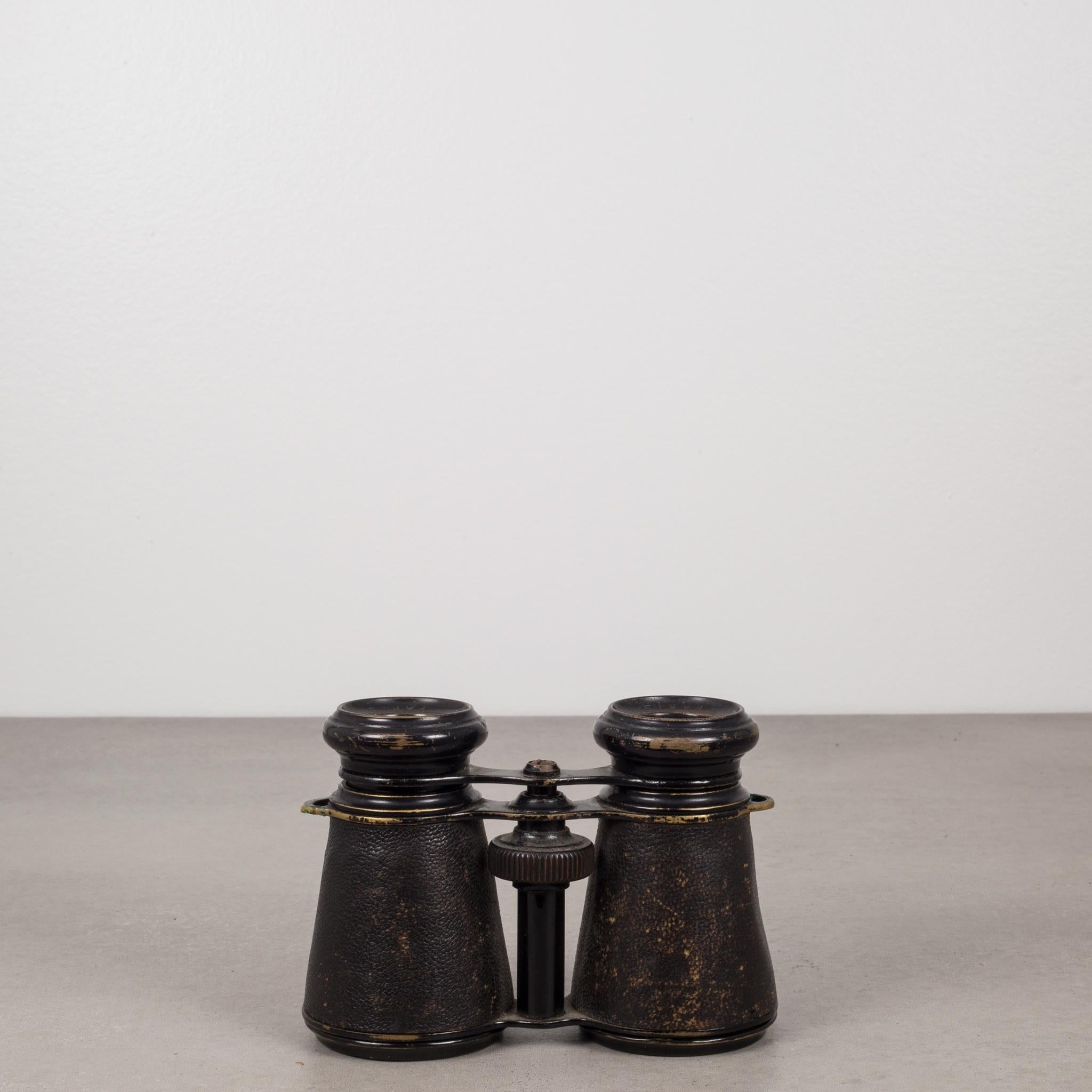 This is an original pair of French military Galilean binoculars manufactured by Jacques in France. They are marked on each eyepiece with 