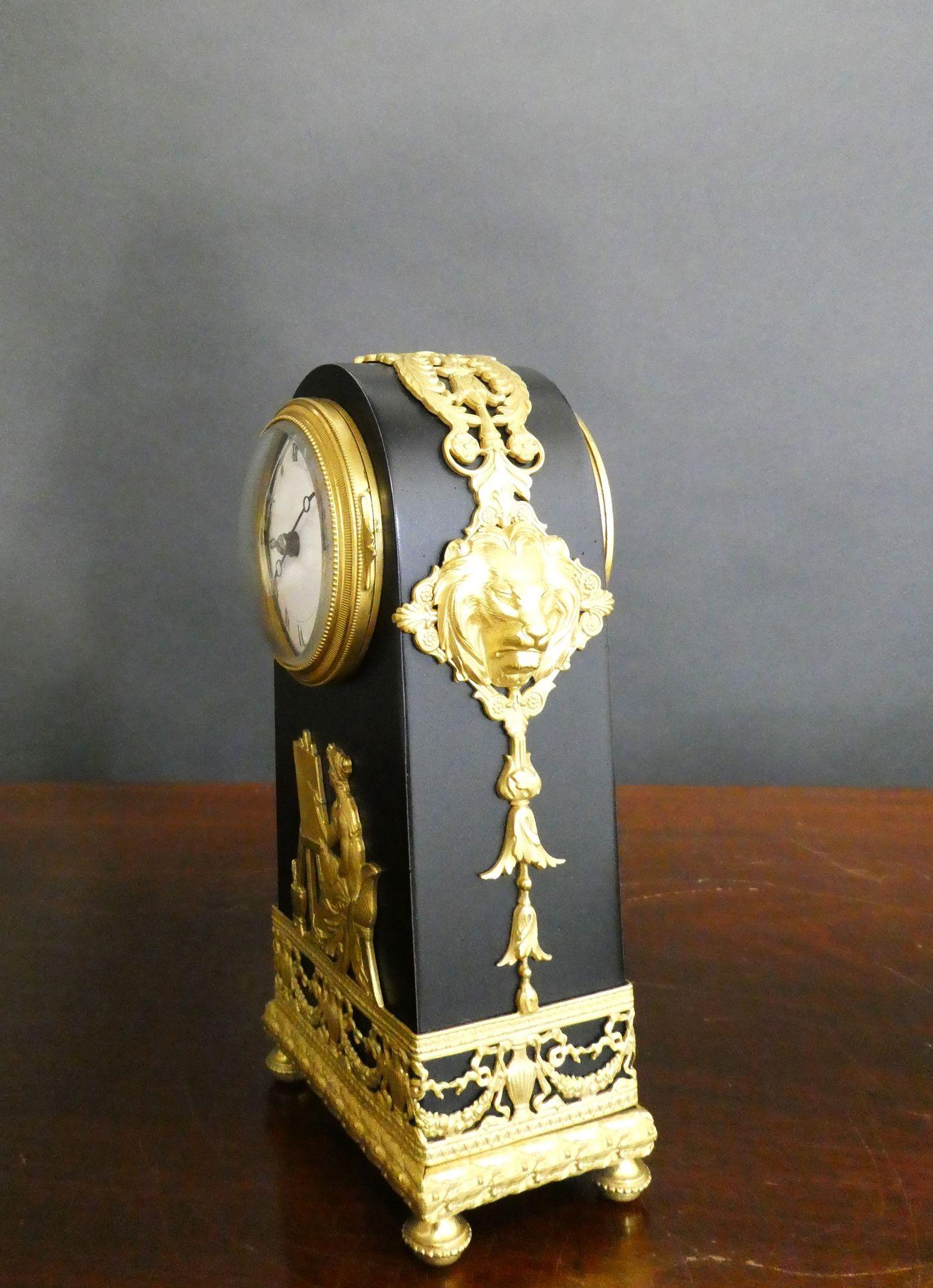 French Miniature Patinated Bronze and Ormolu Mantel Clock For Sale 2