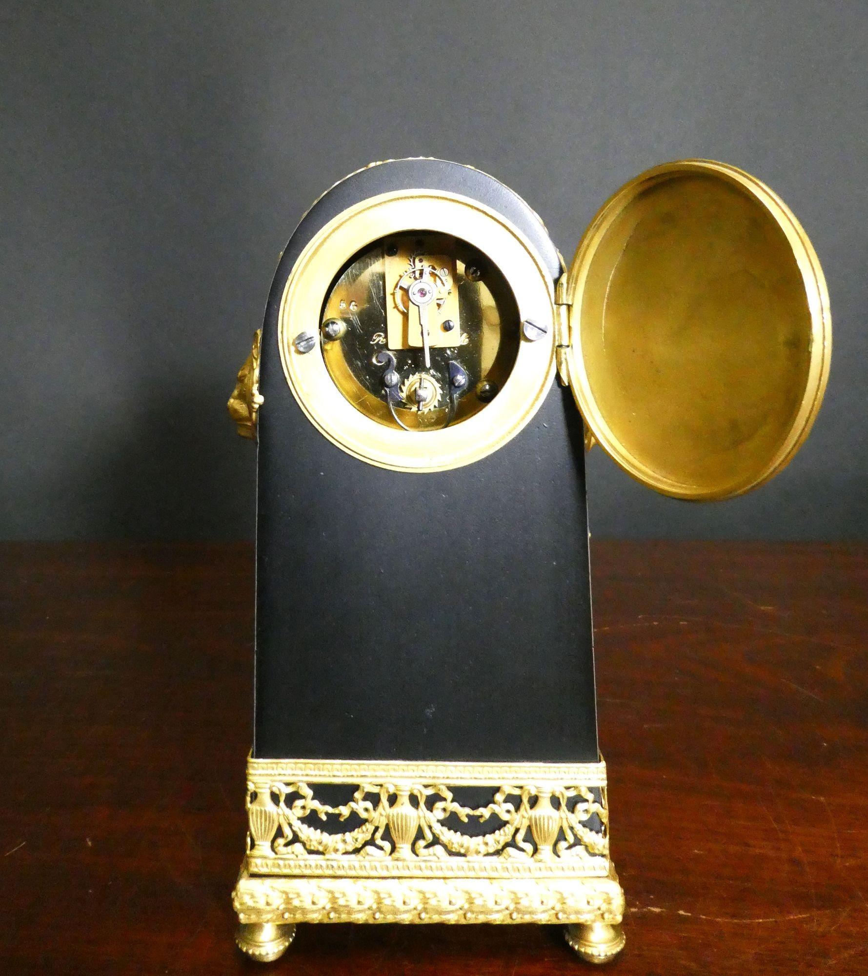 French Miniature Patinated Bronze and Ormolu Mantel Clock For Sale 3