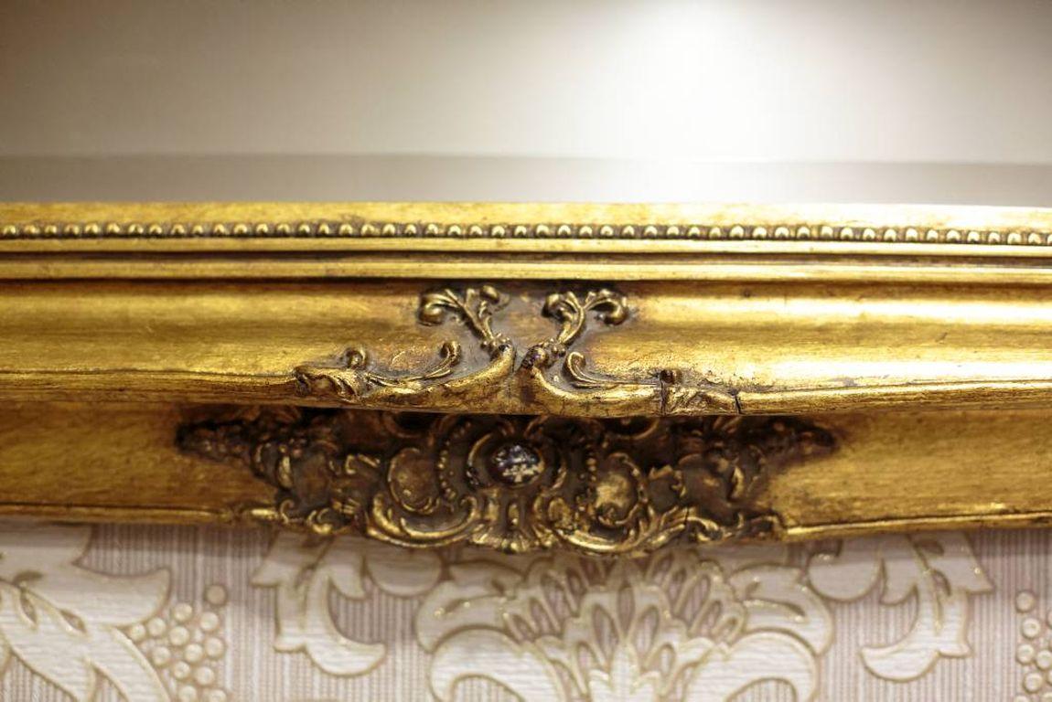 We present you this mirror circa 1900, which style refers to the Louis XV furniture.
The frame is wooden, gilded with ornamented molding.
The mirror has beveled edges.

Dimensions with frame: 80 x 71 cm.

The whole is in very good condition.